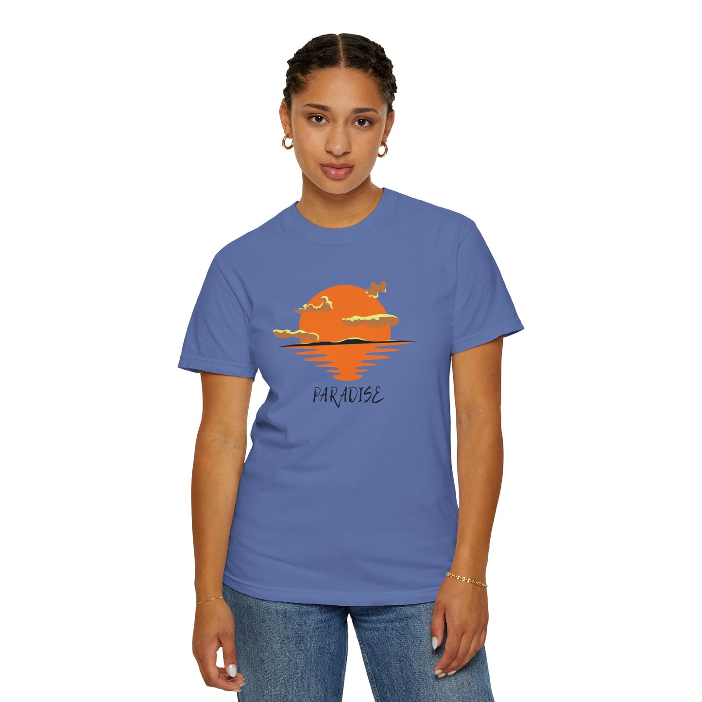 Person wearing a blue t-shirt with a sunset design and 'Paradise' text on a white background