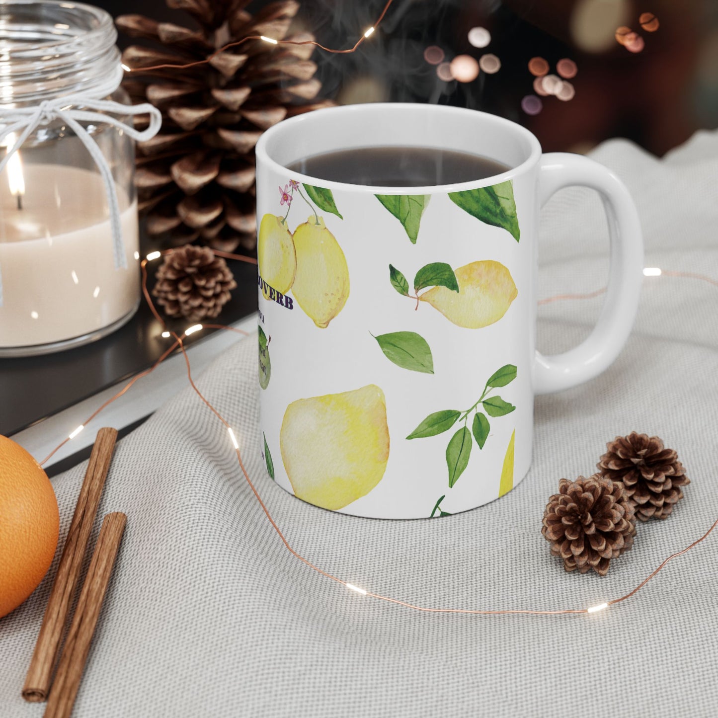 Mug with lemon design on a table with decorative items
