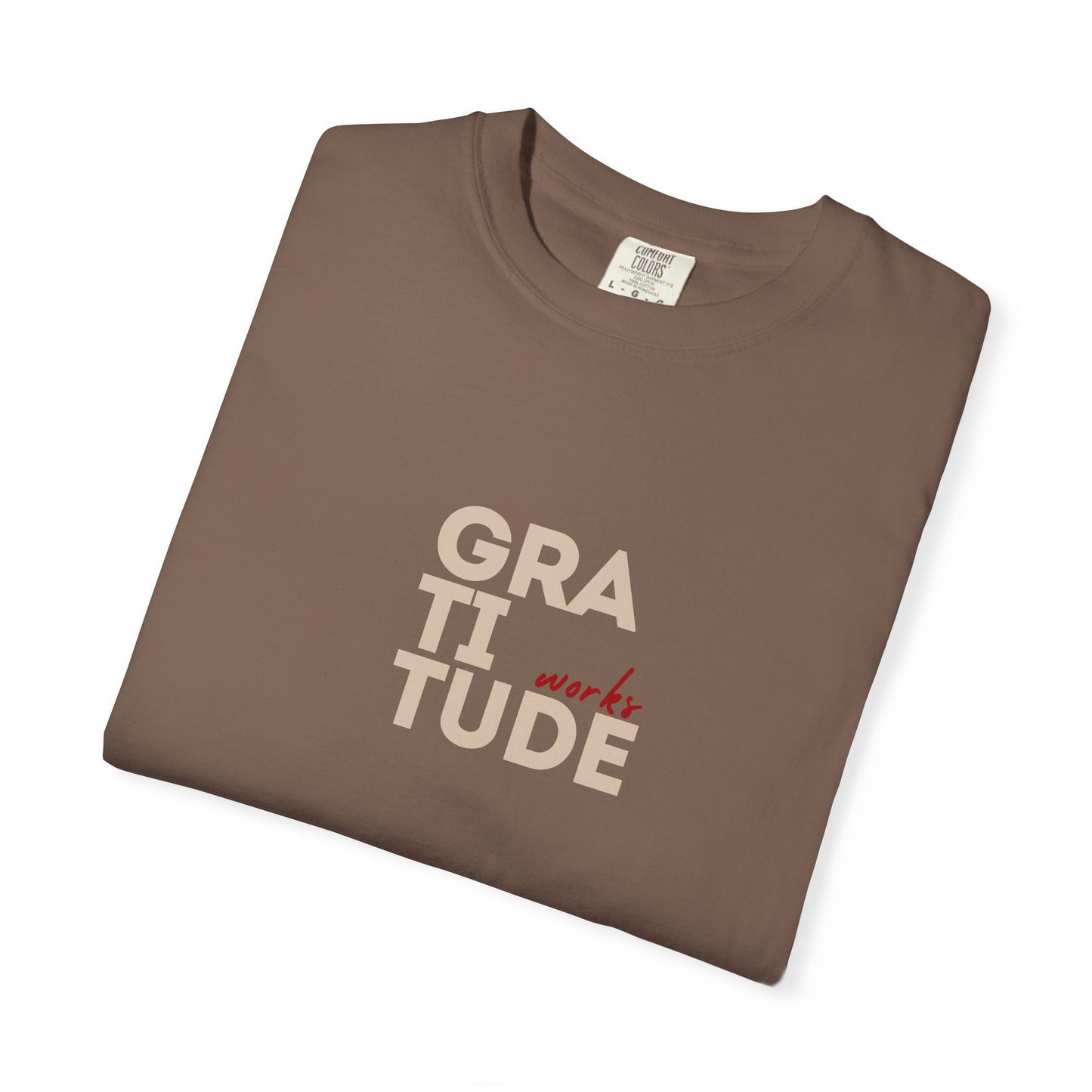 Folded espresso brown t-shirt with 'GRATITUDE' text on a white background