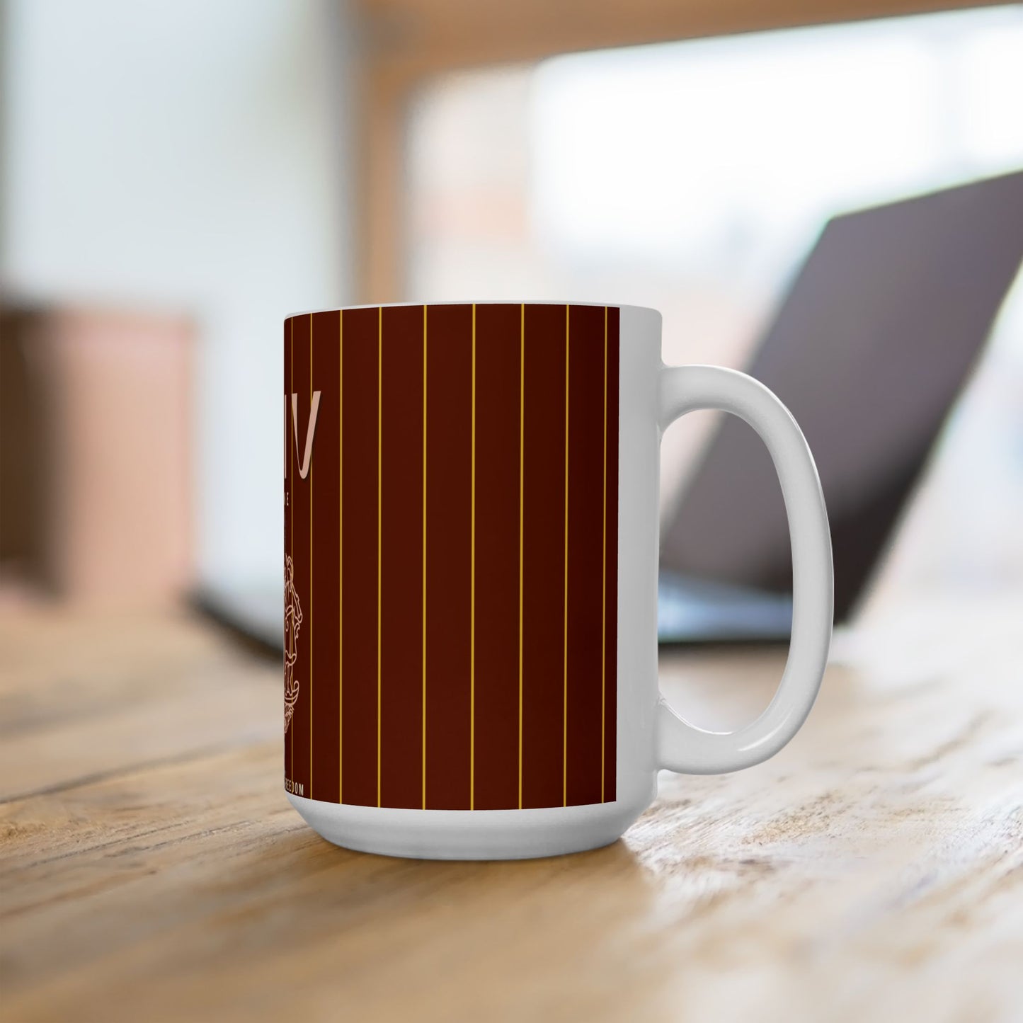 White mug with brown striped pattern on a wooden surface