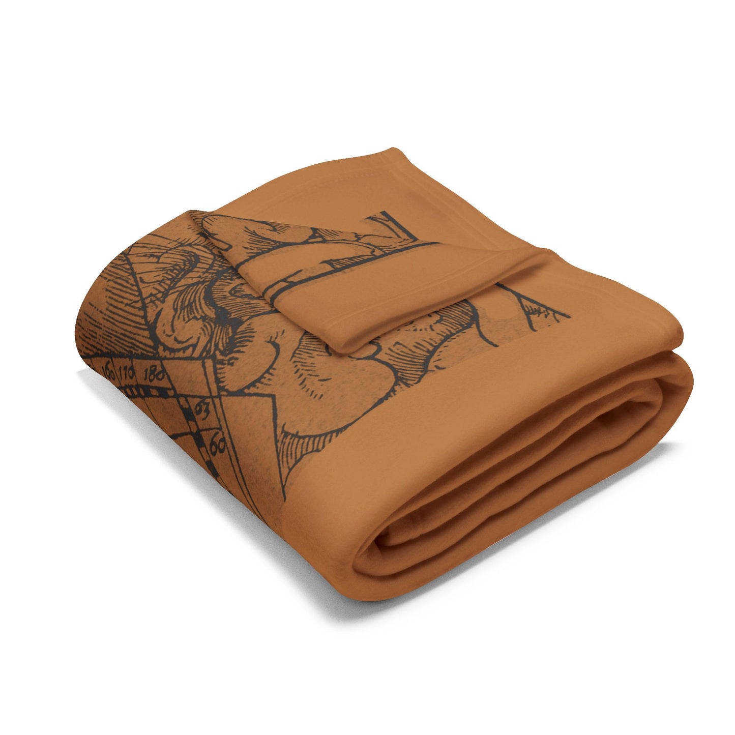 Folded brown blanket with black ship design on a white background