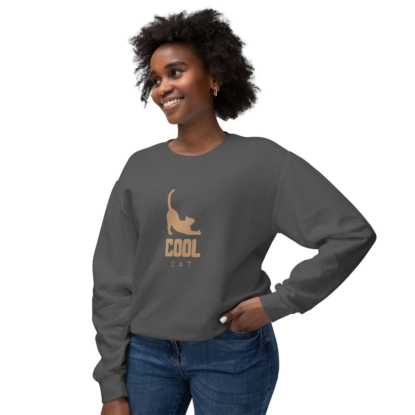 Woman wearing a gray sweatshirt with a cat graphic and 'COOL CAT' text on a white background