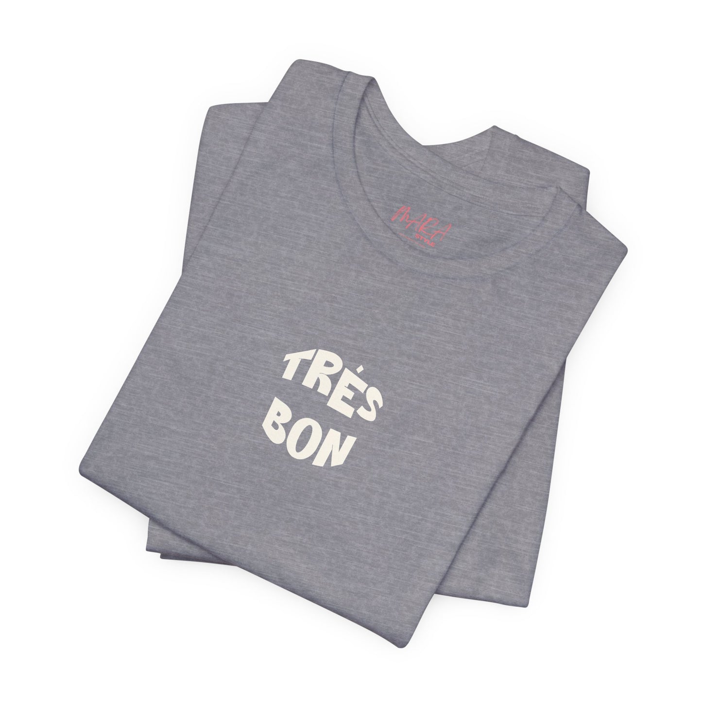 Folded gray t-shirt with 'Très Bon' text on a white background