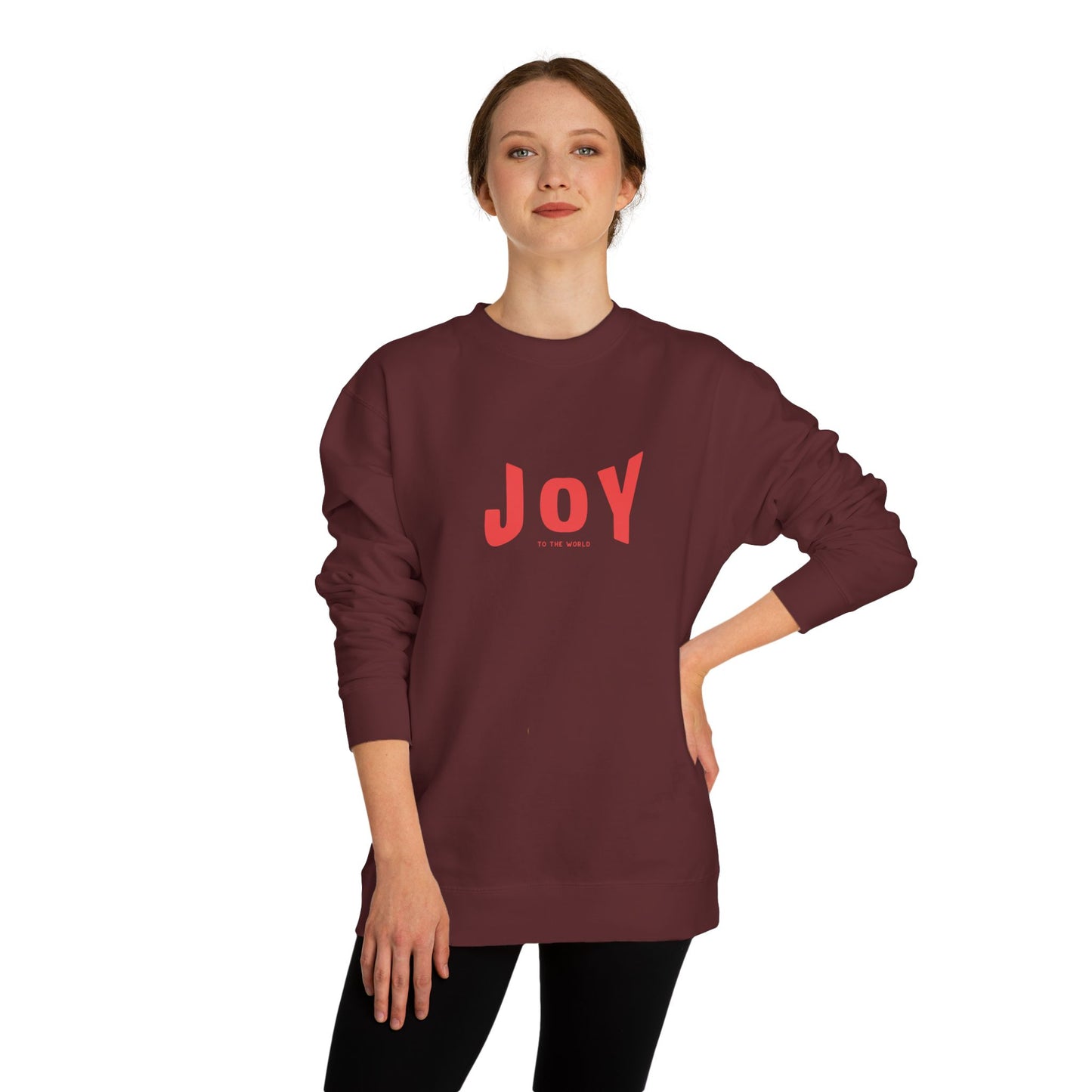 Person wearing a maroon sweatshirt with 'JOY' printed in red on a white background