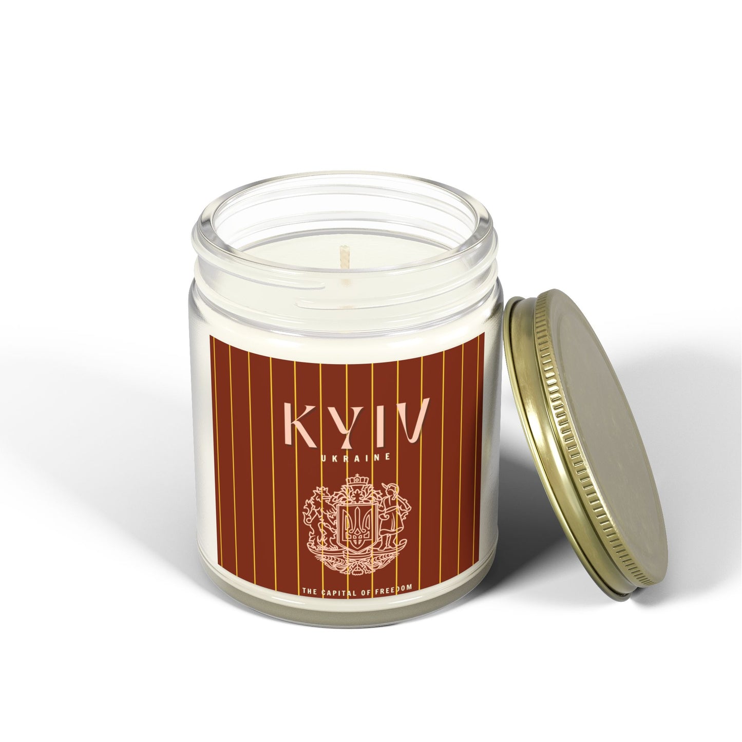 Candle in a glass jar with a brown label featuring 'KYIV' and a logo on a white background.