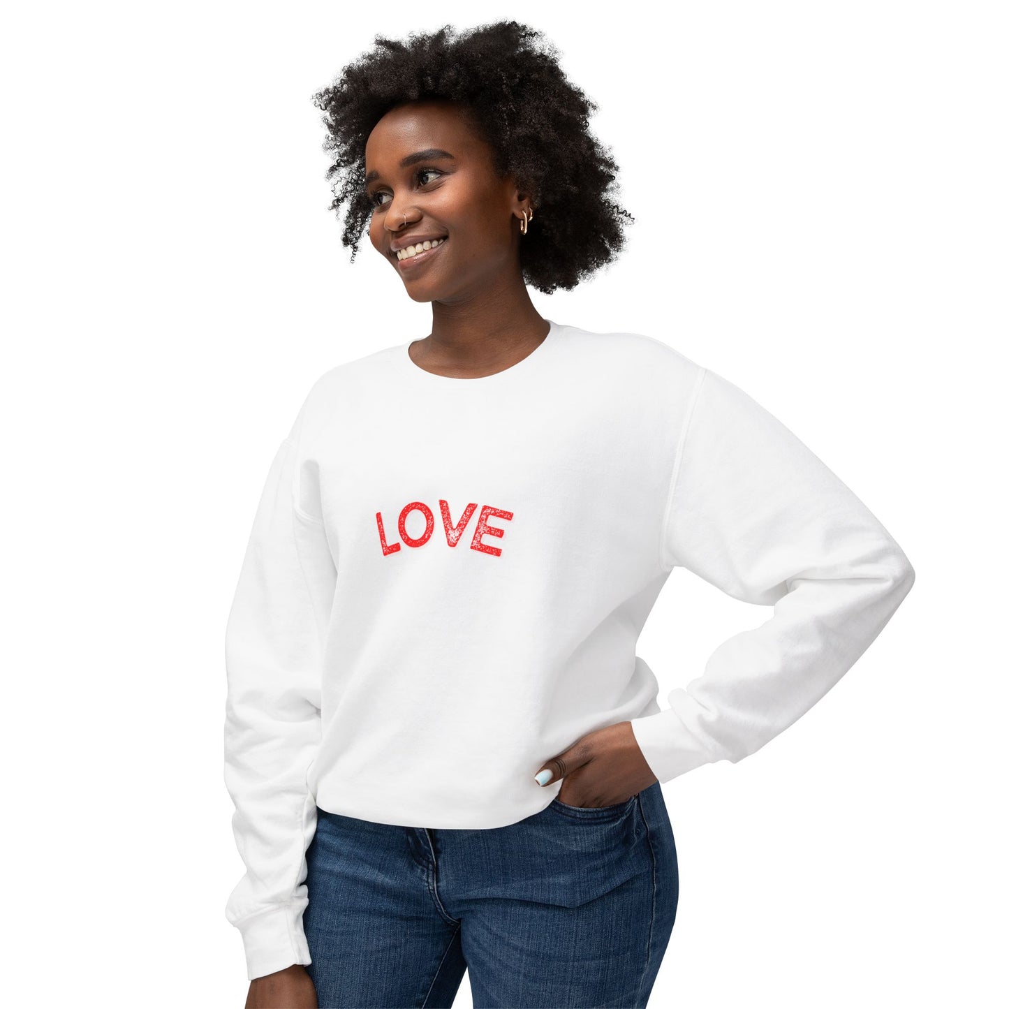 Woman wearing a white sweatshirt with 'LOVE' printed in red on a white background