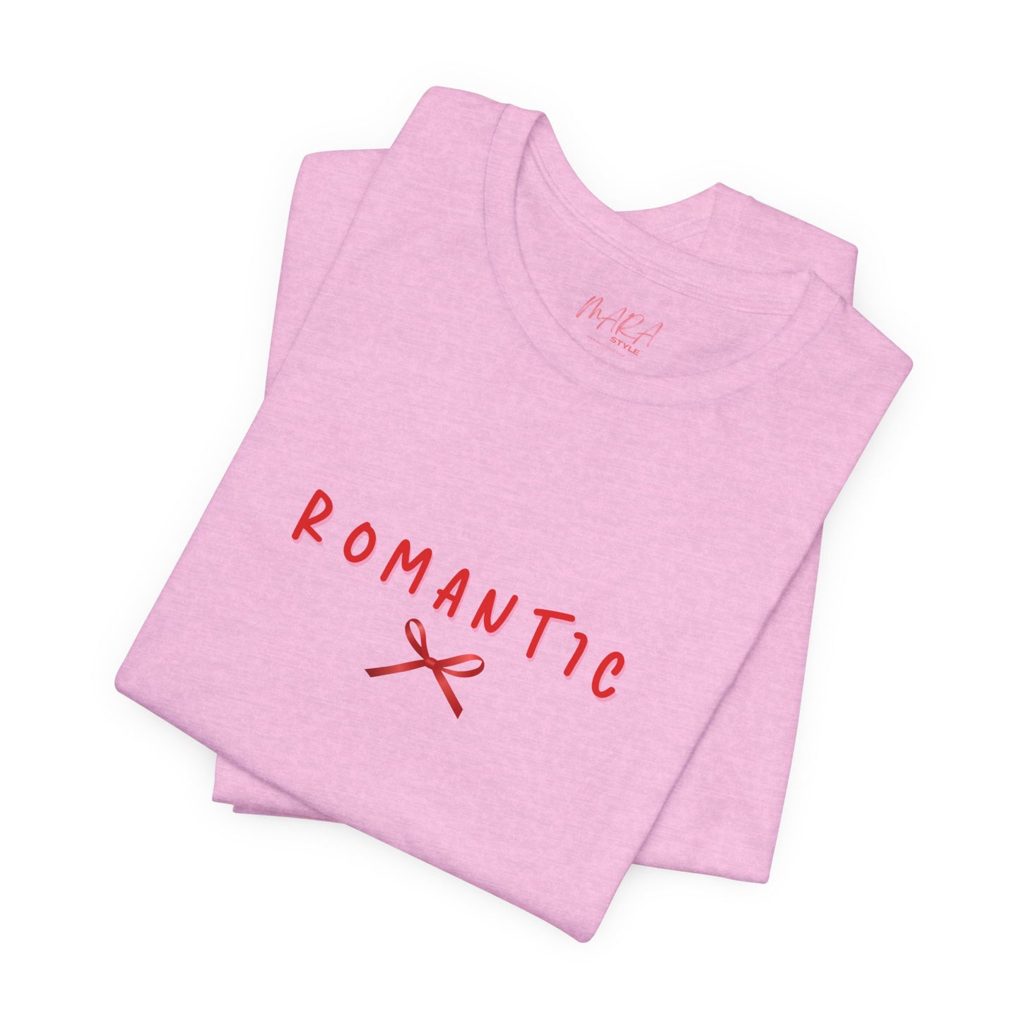 Pink t-shirt with 'ROMANTIC' and a bow graphic on a white background