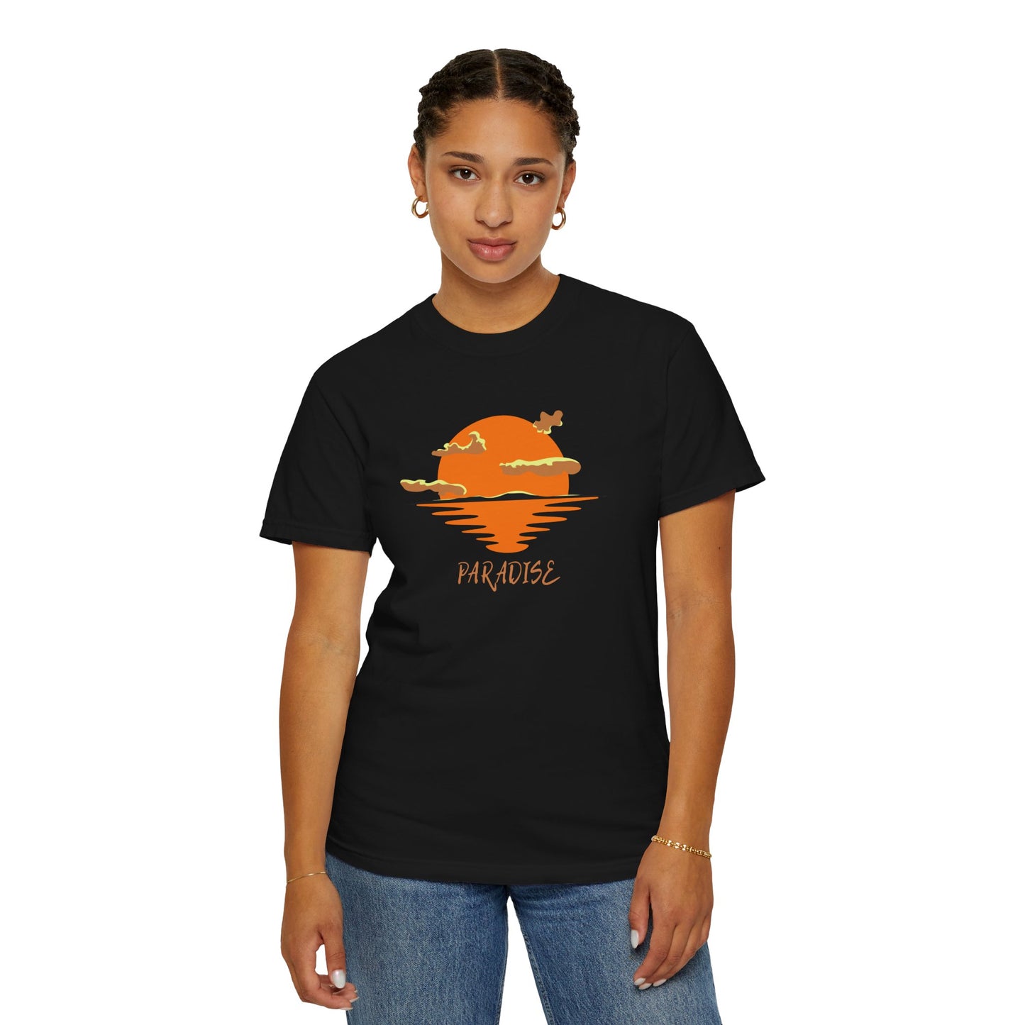Person wearing a black t-shirt with an orange graphic and 'Paradise' text on a white background