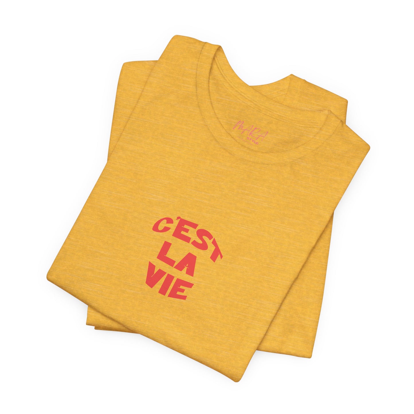 Yellow t-shirt with red text 'CEST LA VIE' on a white background