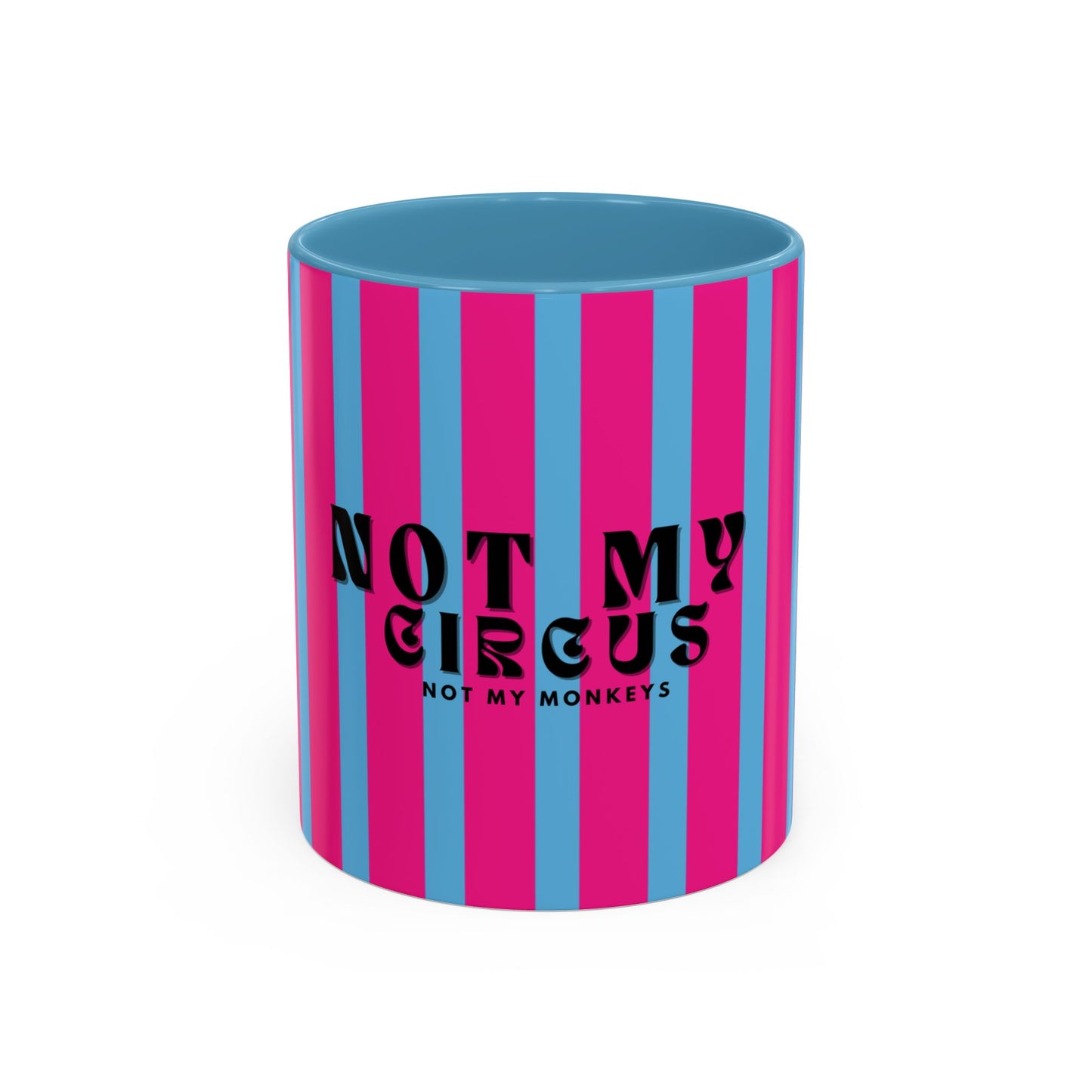 Striped mug with pink and blue vertical stripes and text 'Not my circus, not my monkeys' on a white background