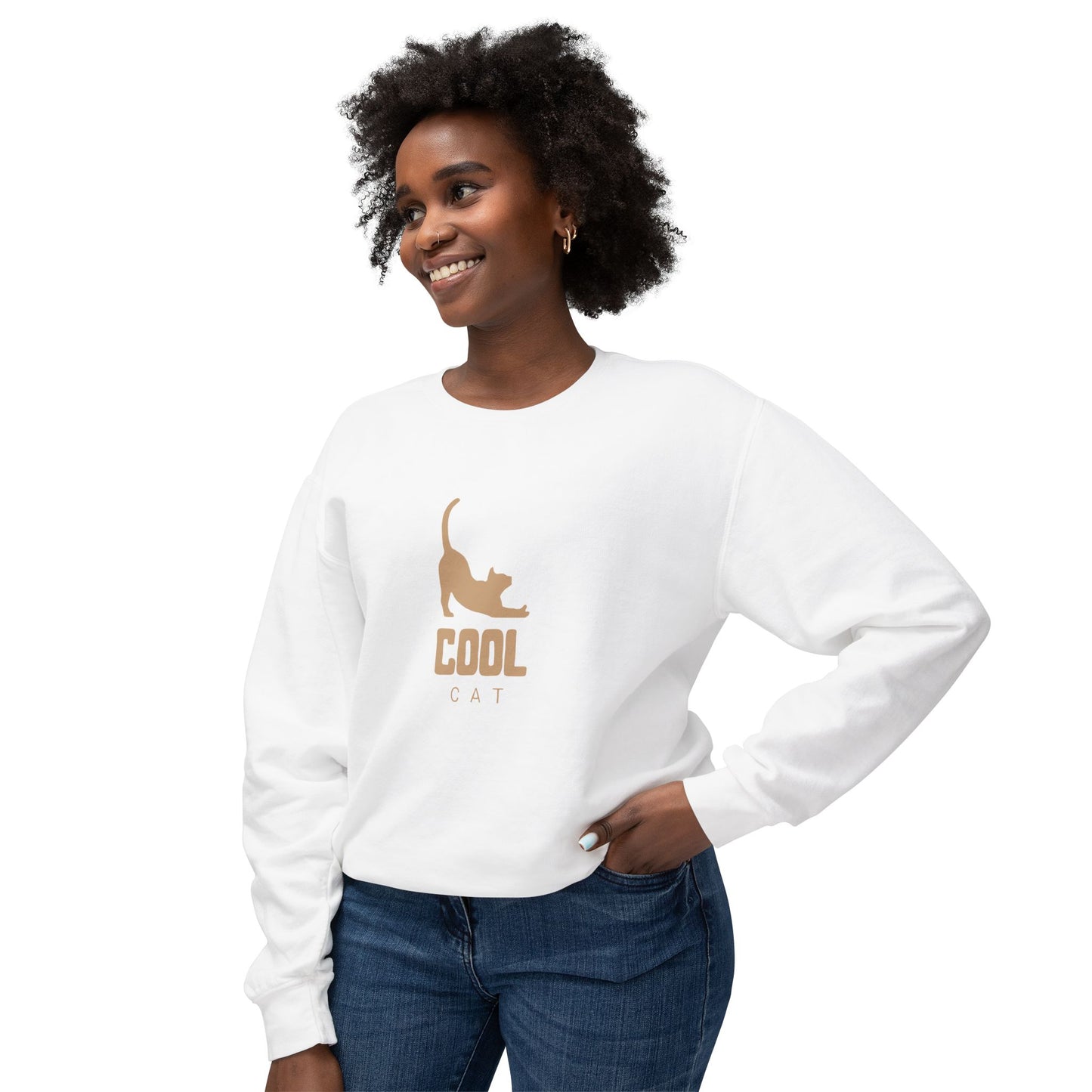 Woman wearing a white sweatshirt with a cat graphic and 'COOL CAT' text on a white background