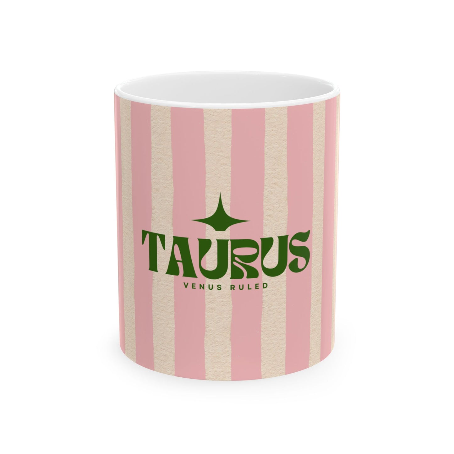 Mug with pink and beige striped pattern and 'Taurus' text on a white background