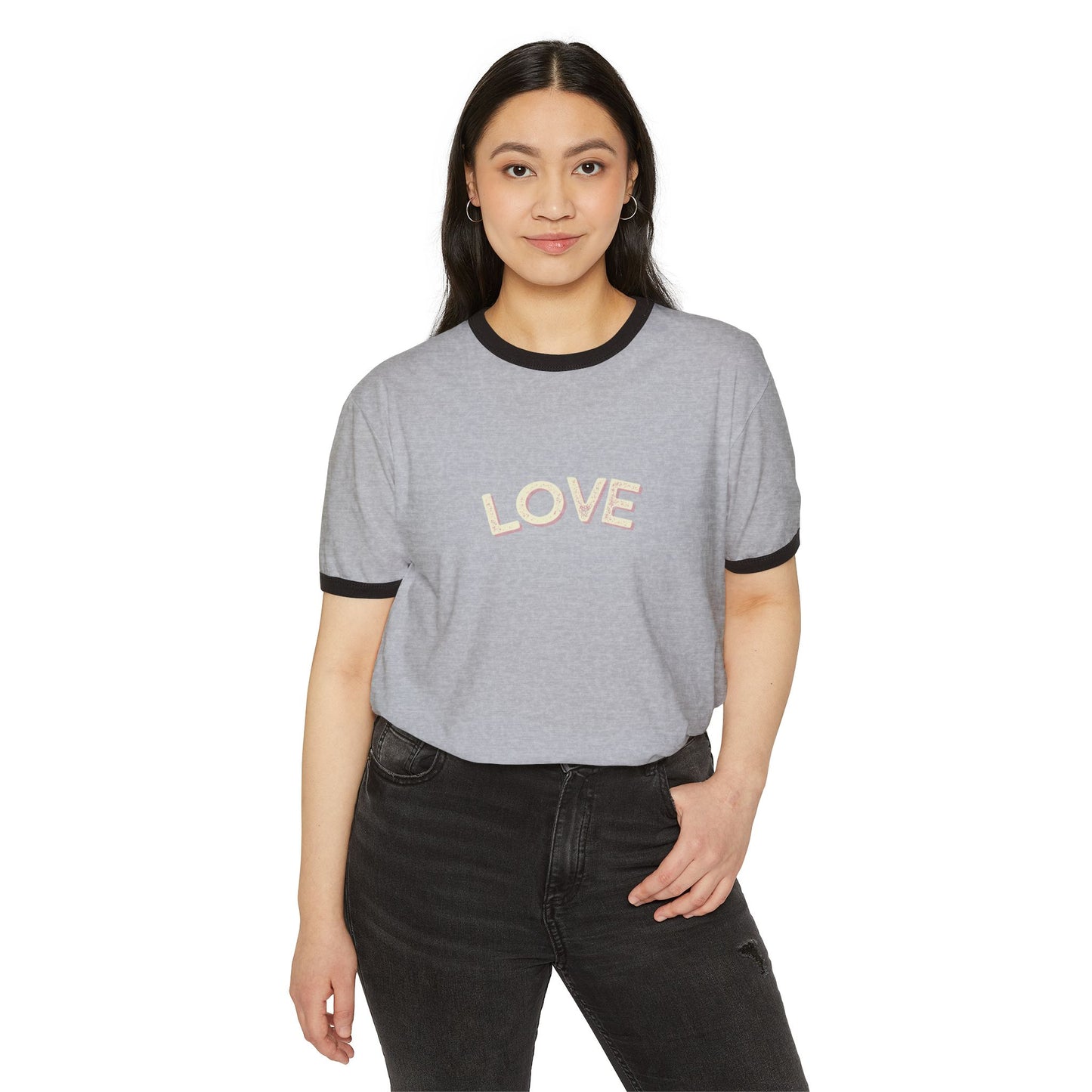 Woman wearing a gray 'LOVE' t-shirt on a white background
