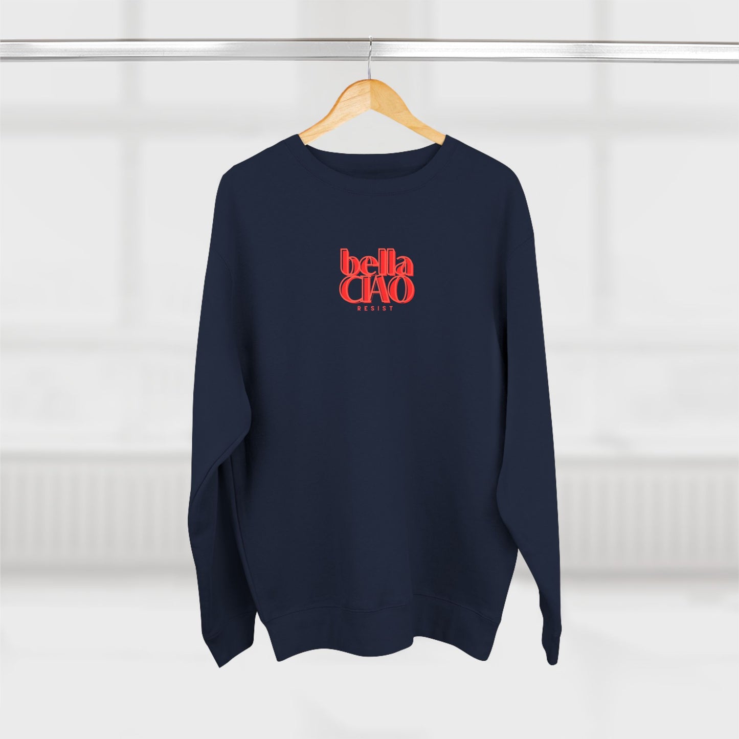 Navy blue sweatshirt with red 'bella Ciao' text on a hanger against a white background