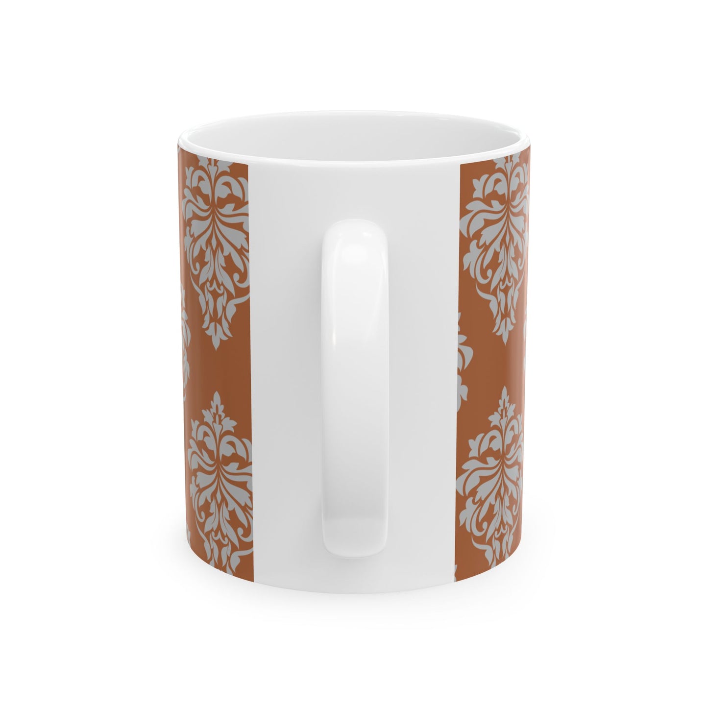 White mug with brown and white floral patterns on a white background