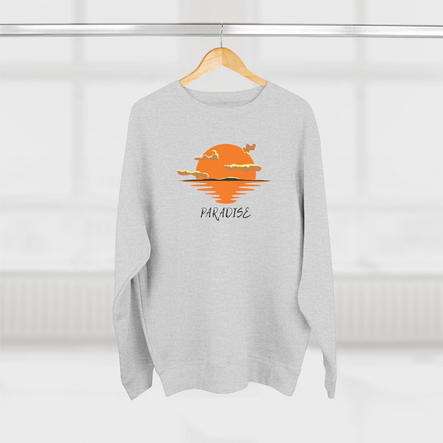 Gray sweatshirt with a sunset design and 'Paradise' text on a white background