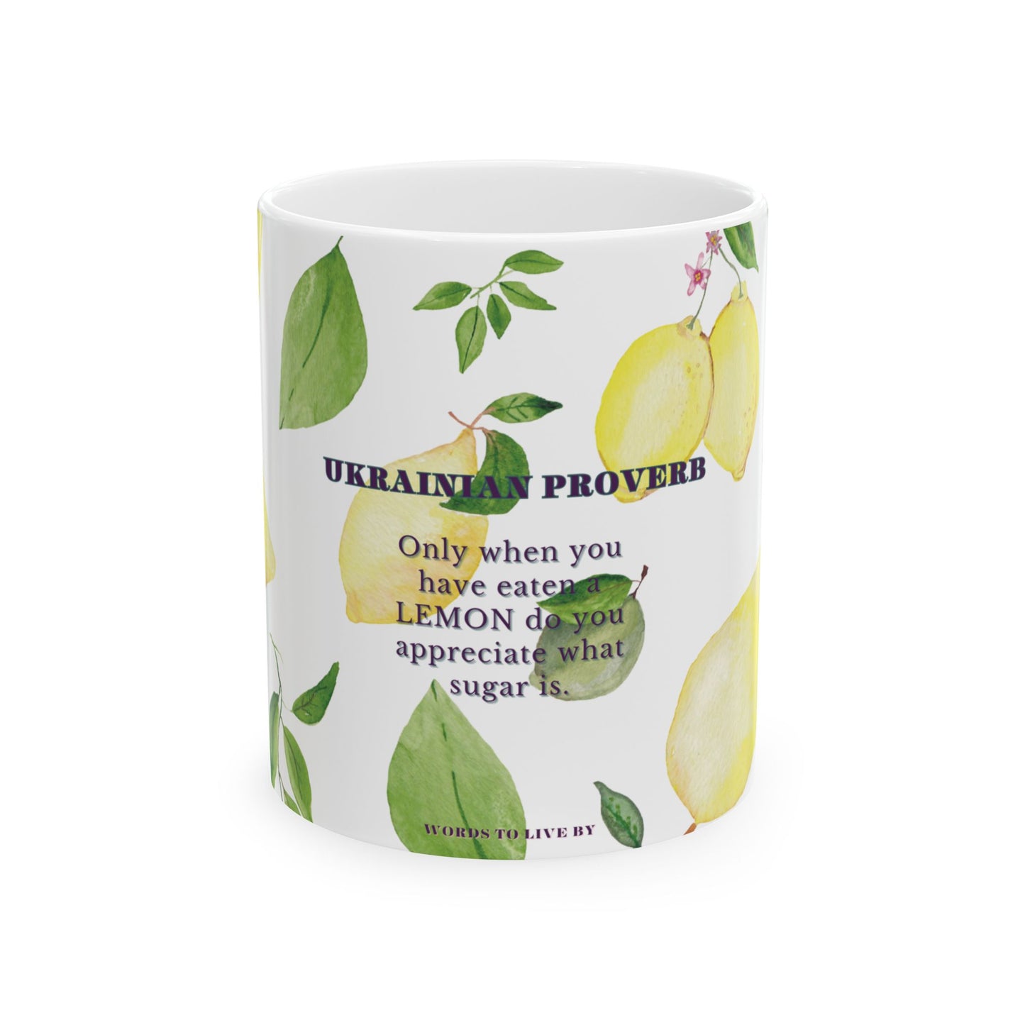 Mug with lemon design and Ukrainian proverb text on a white background