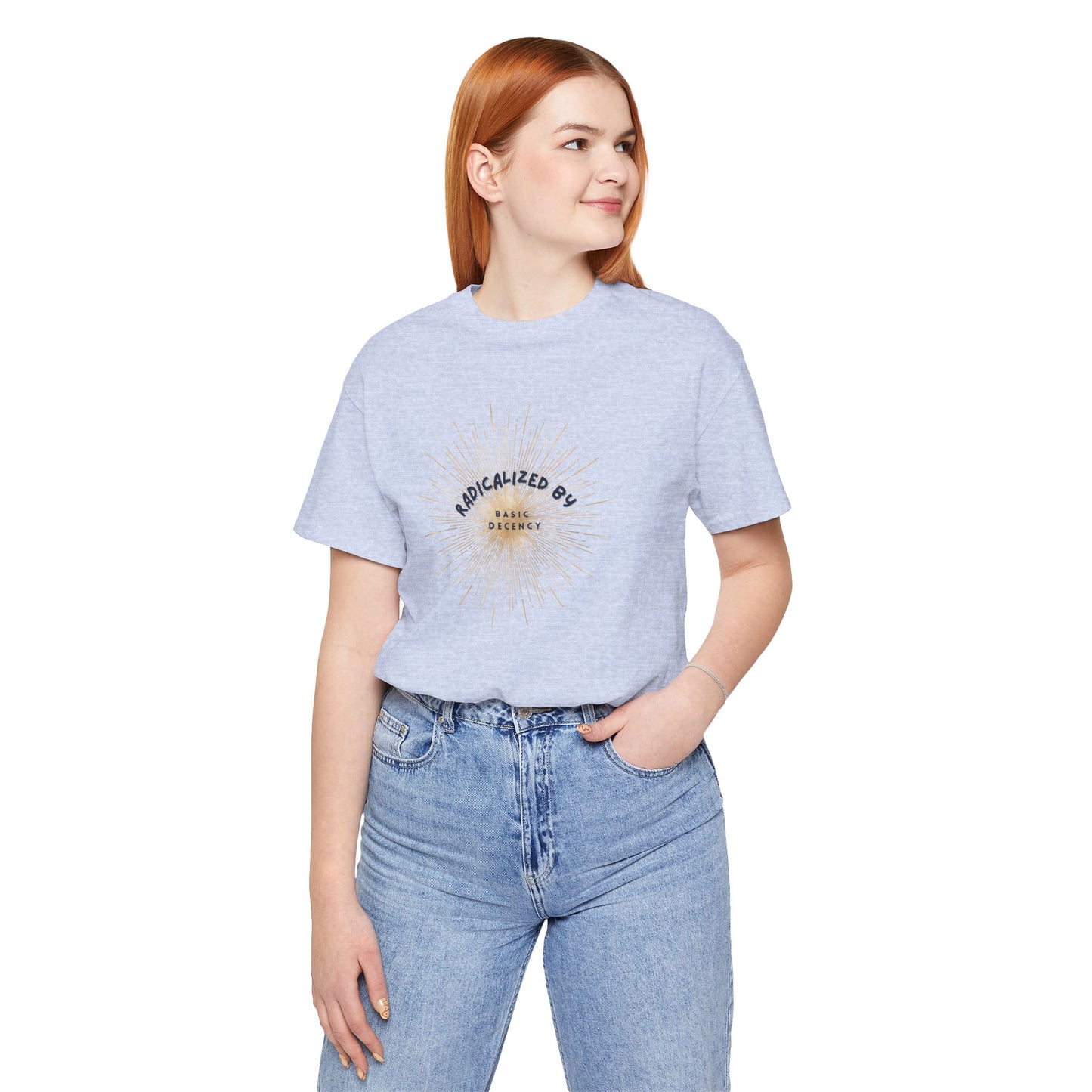 Person wearing a light blue t-shirt with text and graphics, standing against a white background