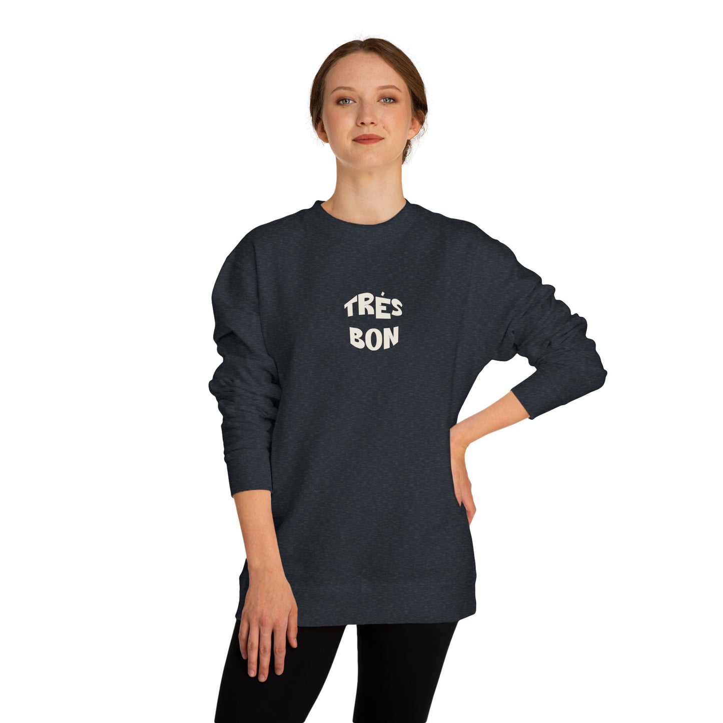 Person wearing a black sweatshirt with 'TRES BON' text on a white background