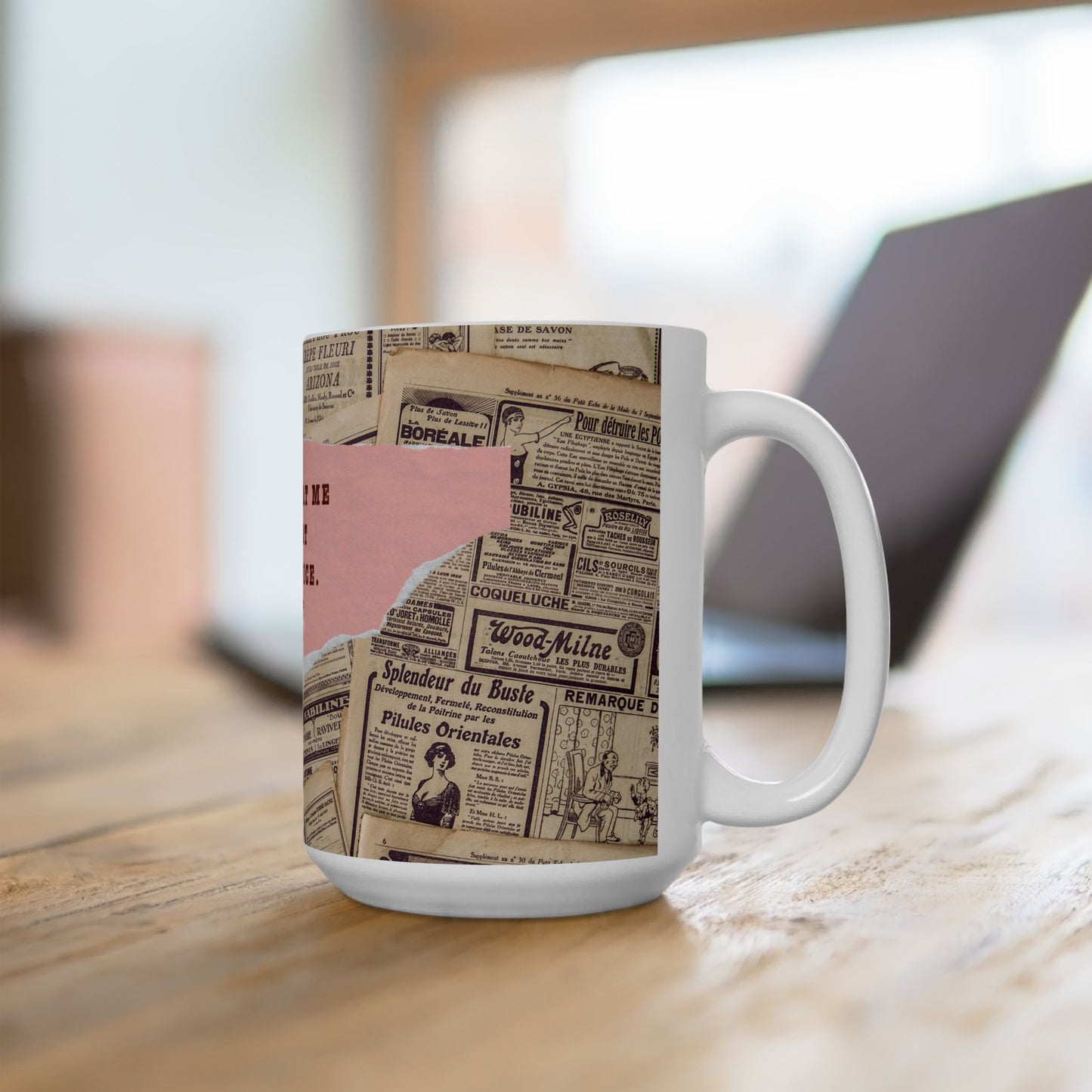 Mug with vintage newspaper design on a wooden surface
