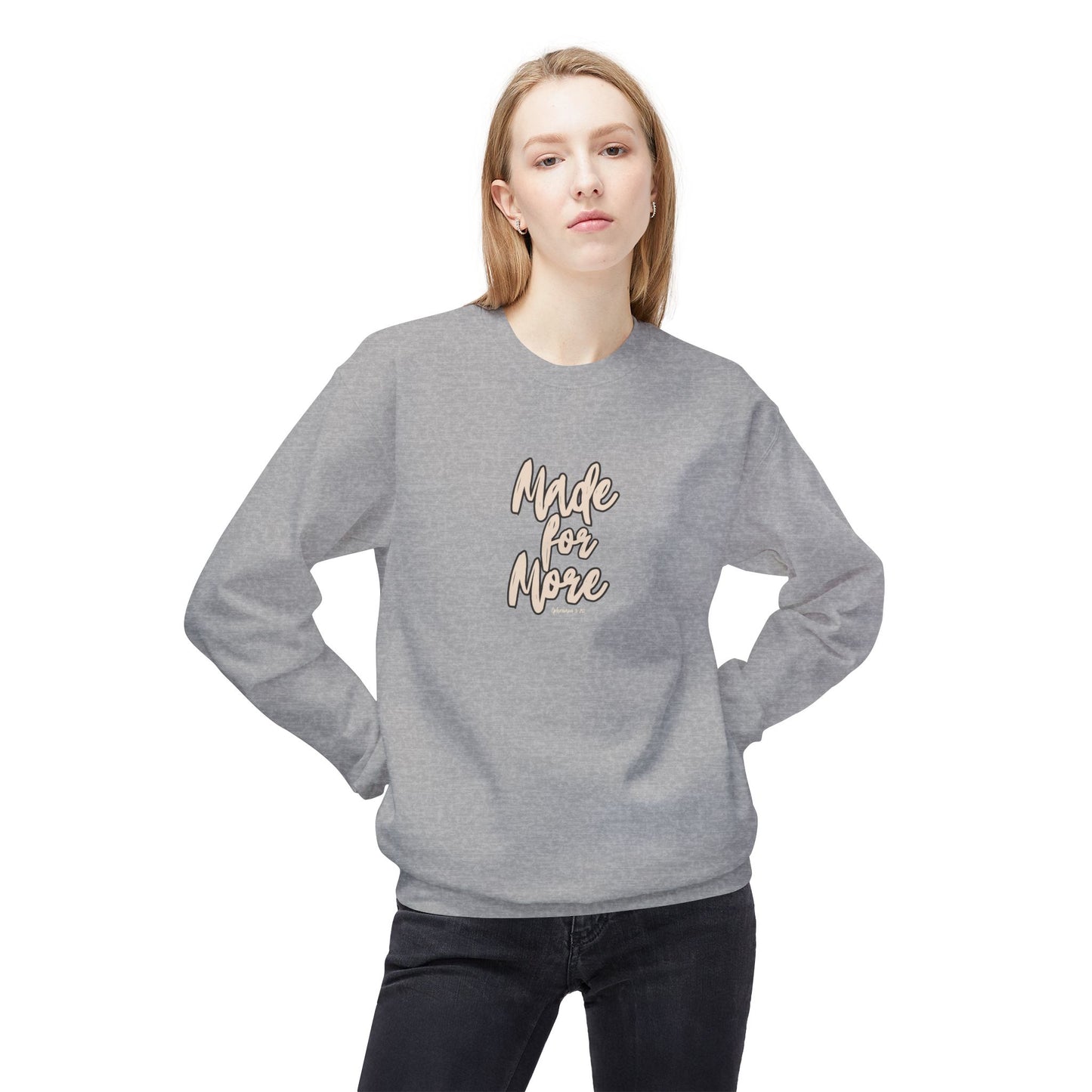 Person wearing a gray sweatshirt with 'Made for More' text on a white background