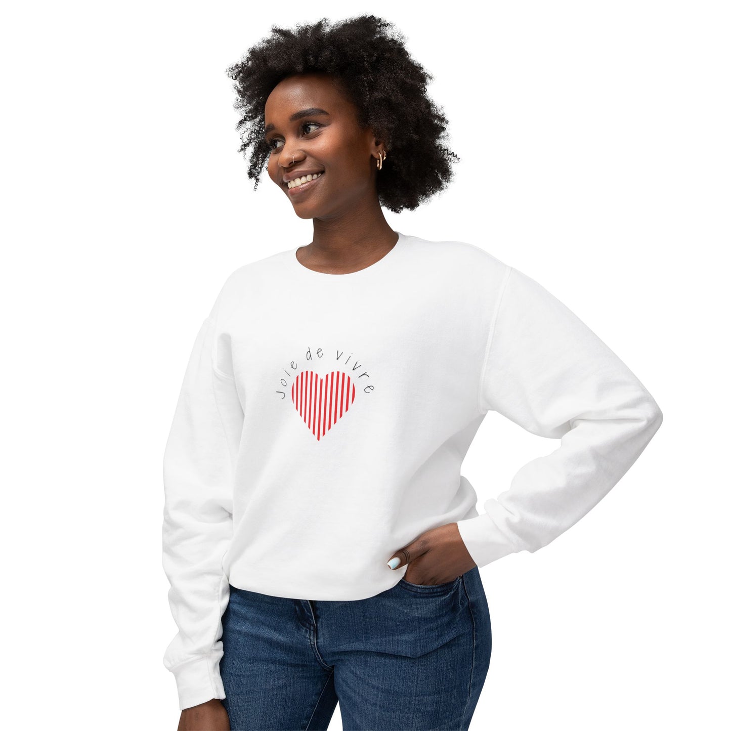 Woman wearing a white sweatshirt with a red heart design on a white background