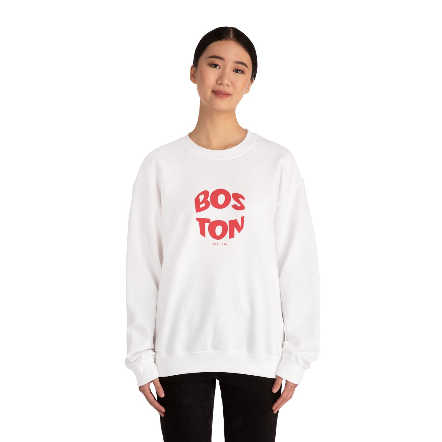 Person wearing a white sweatshirt with 'BOSTON' printed in red on a white background