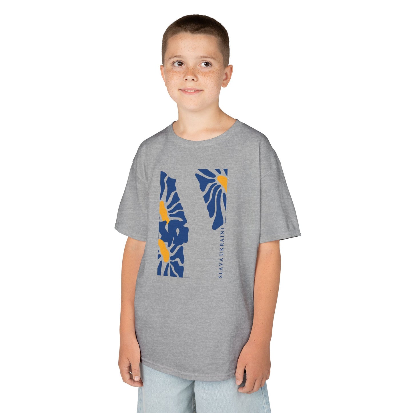 Child wearing a gray t-shirt with blue and yellow SLAVA UKRAINI white background