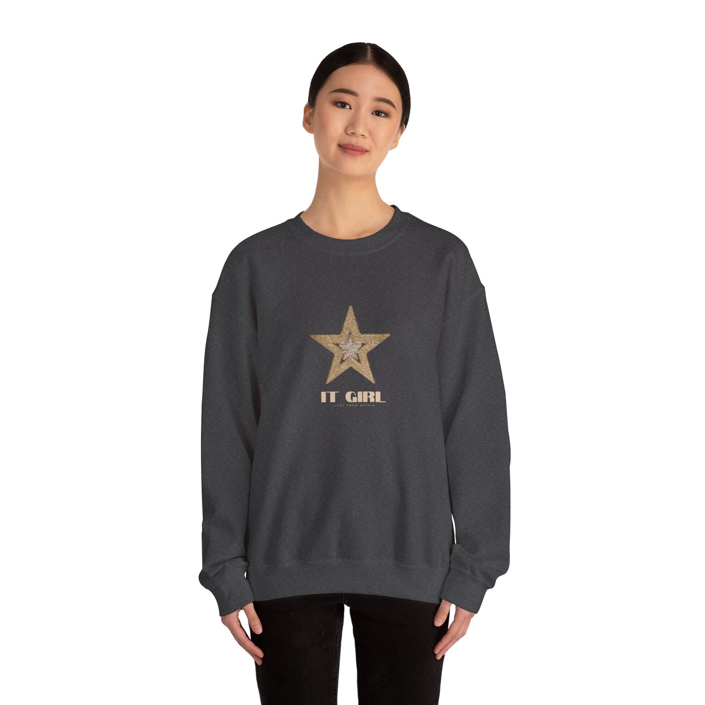 Person wearing a dark gray sweatshirt with a star design and 'IT GIRL' text on a white background