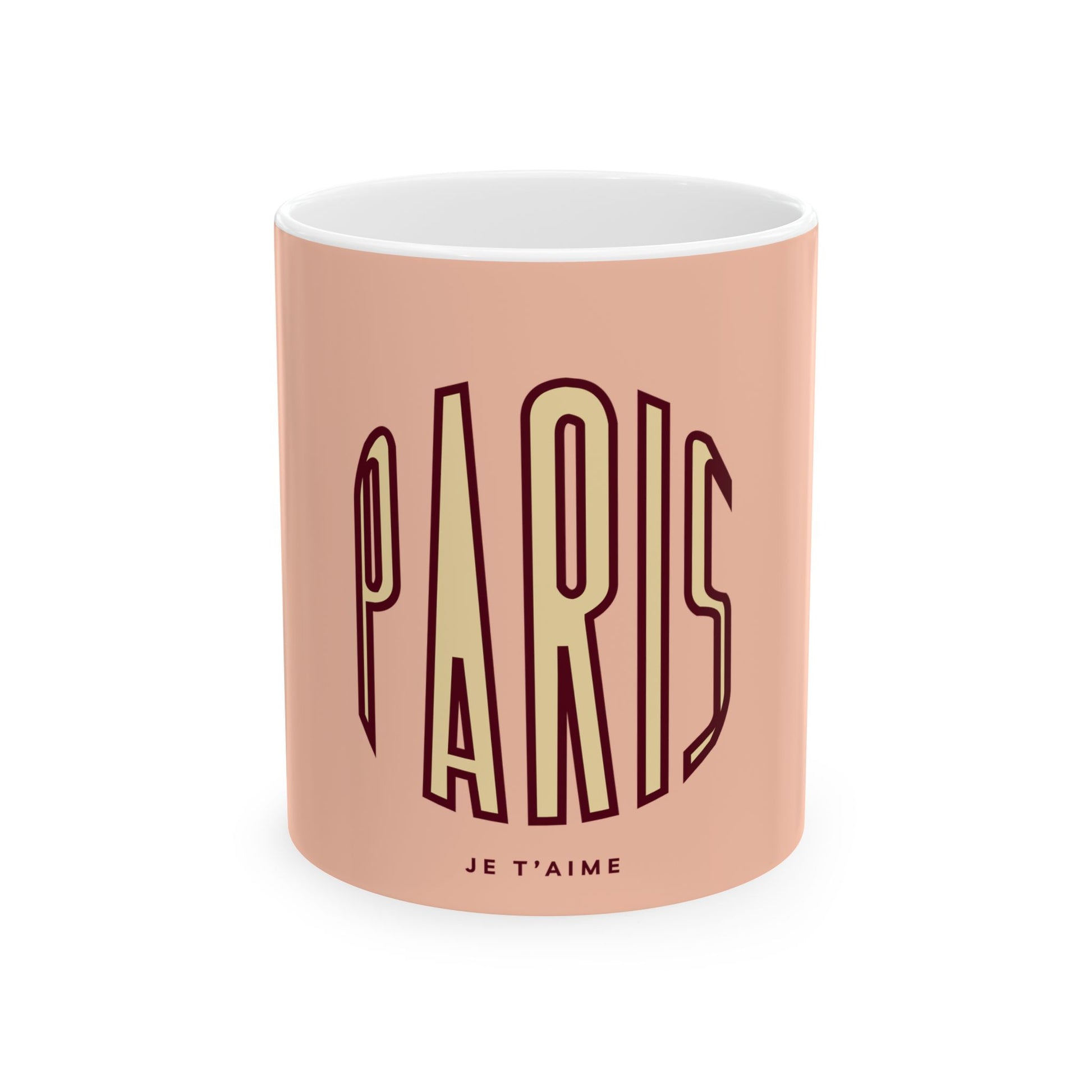 Mug with 'PARIS JE T'AIME' text on a pink background