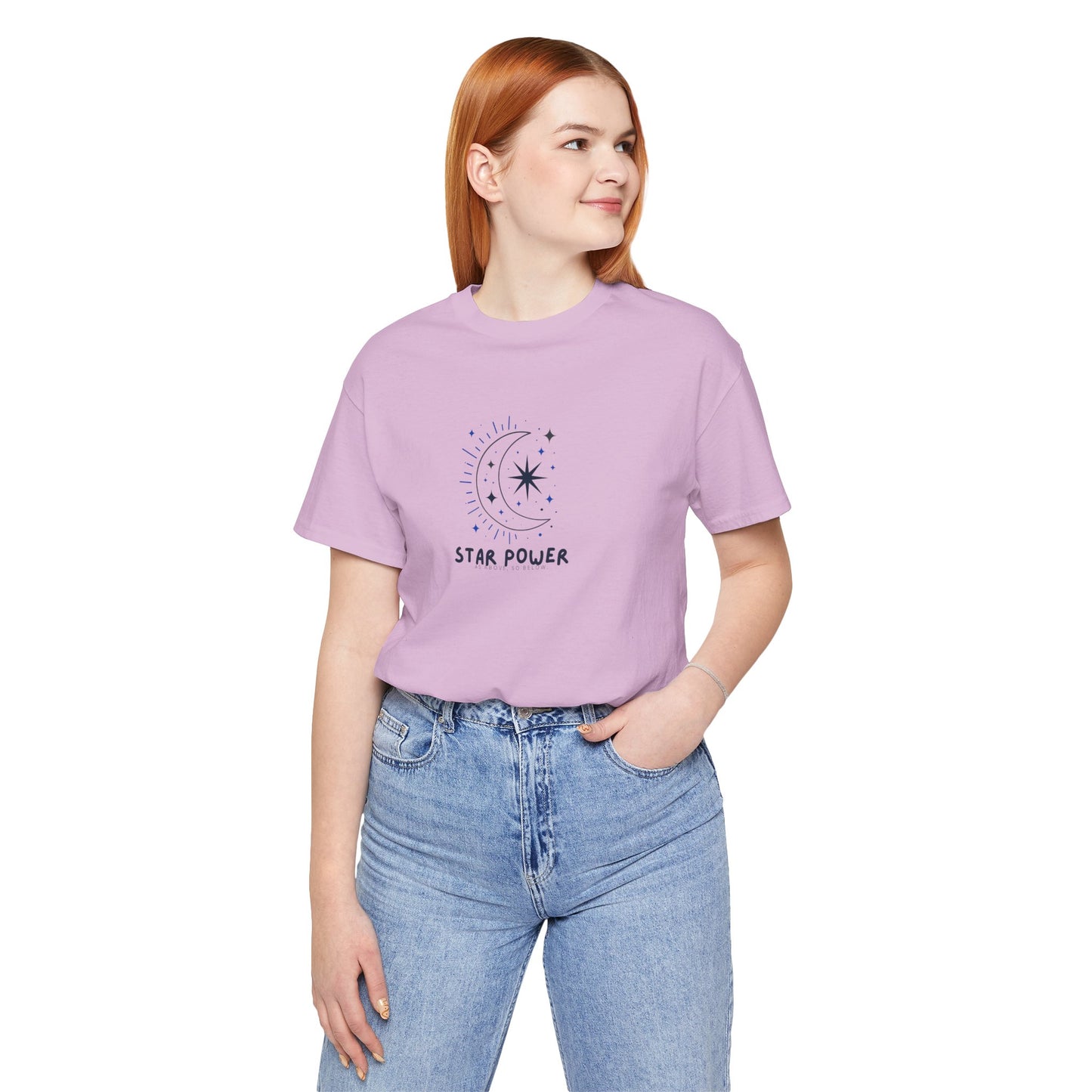 Person wearing a purple t-shirt with text and graphic design on a white background