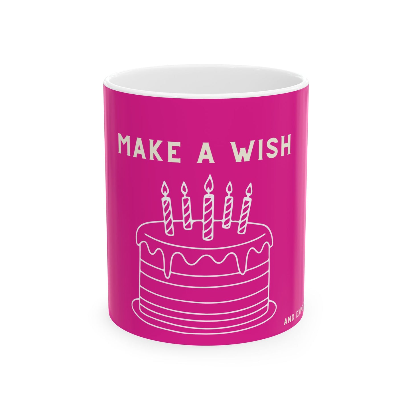 Pink mug with a white cake illustration and 'Make a Wish' text on a white background