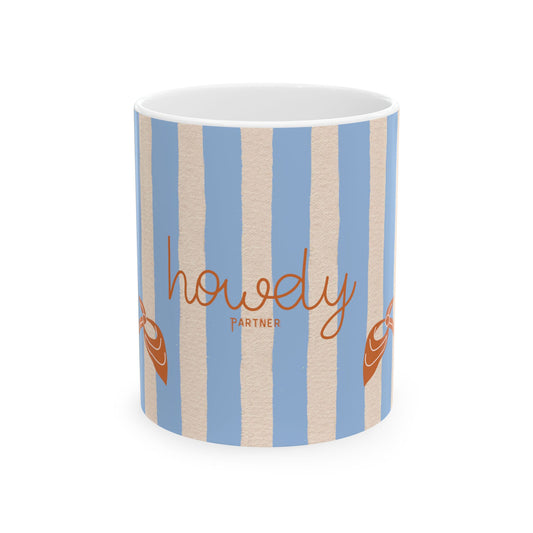 Mug with blue and beige striped pattern and 'howdy partner' text on a white background