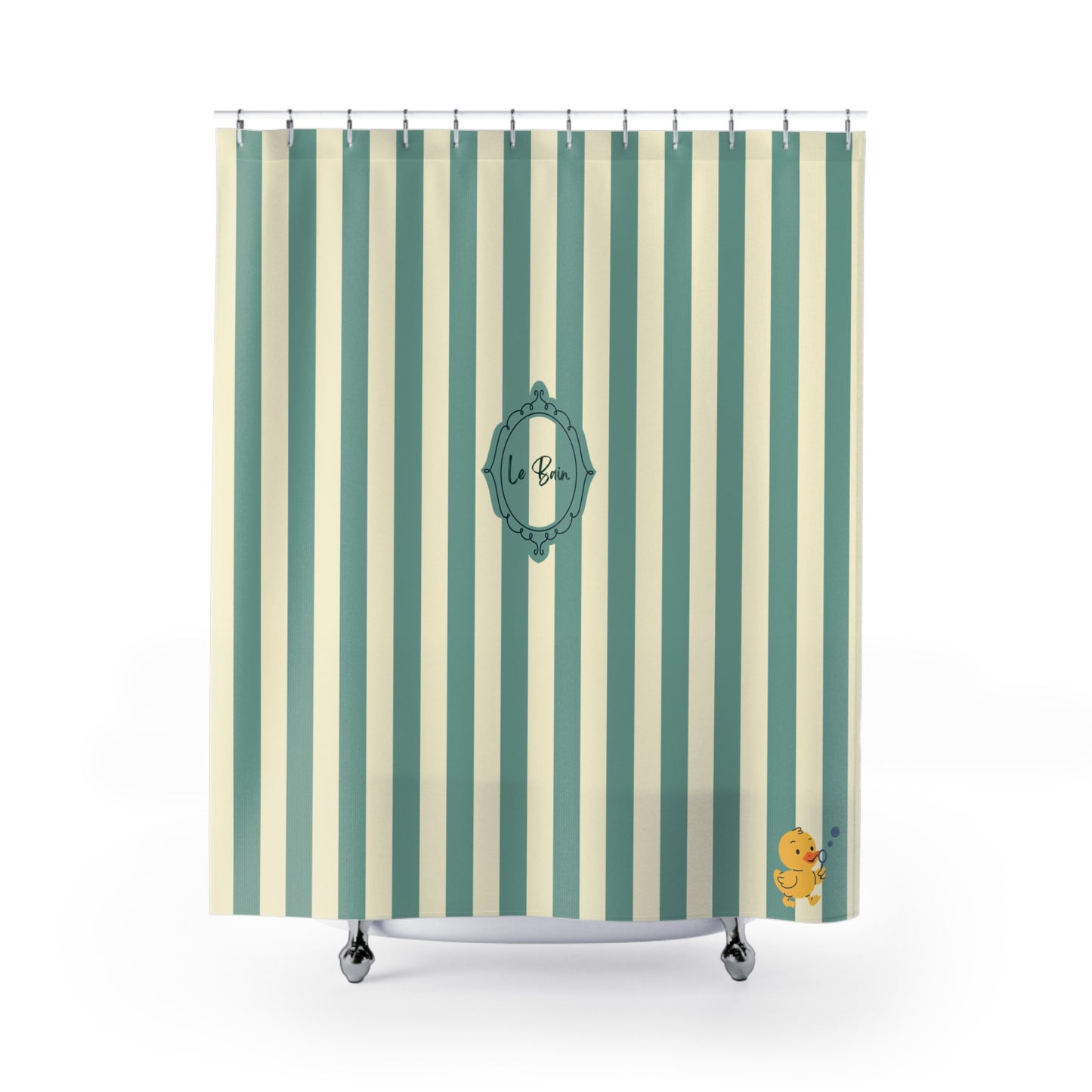 A shower curtain with vertical stripes in sage green and cream, featuring a central teal decorative frame with the monogram 'Le Bain and a small yellow rubber duck in the bottom right corner.