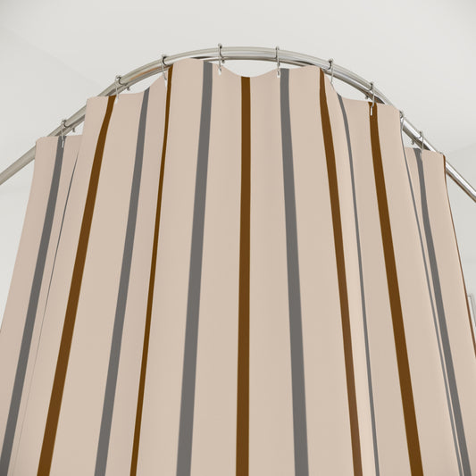 Beige and brown striped shower curtain on a metal rod against a white background