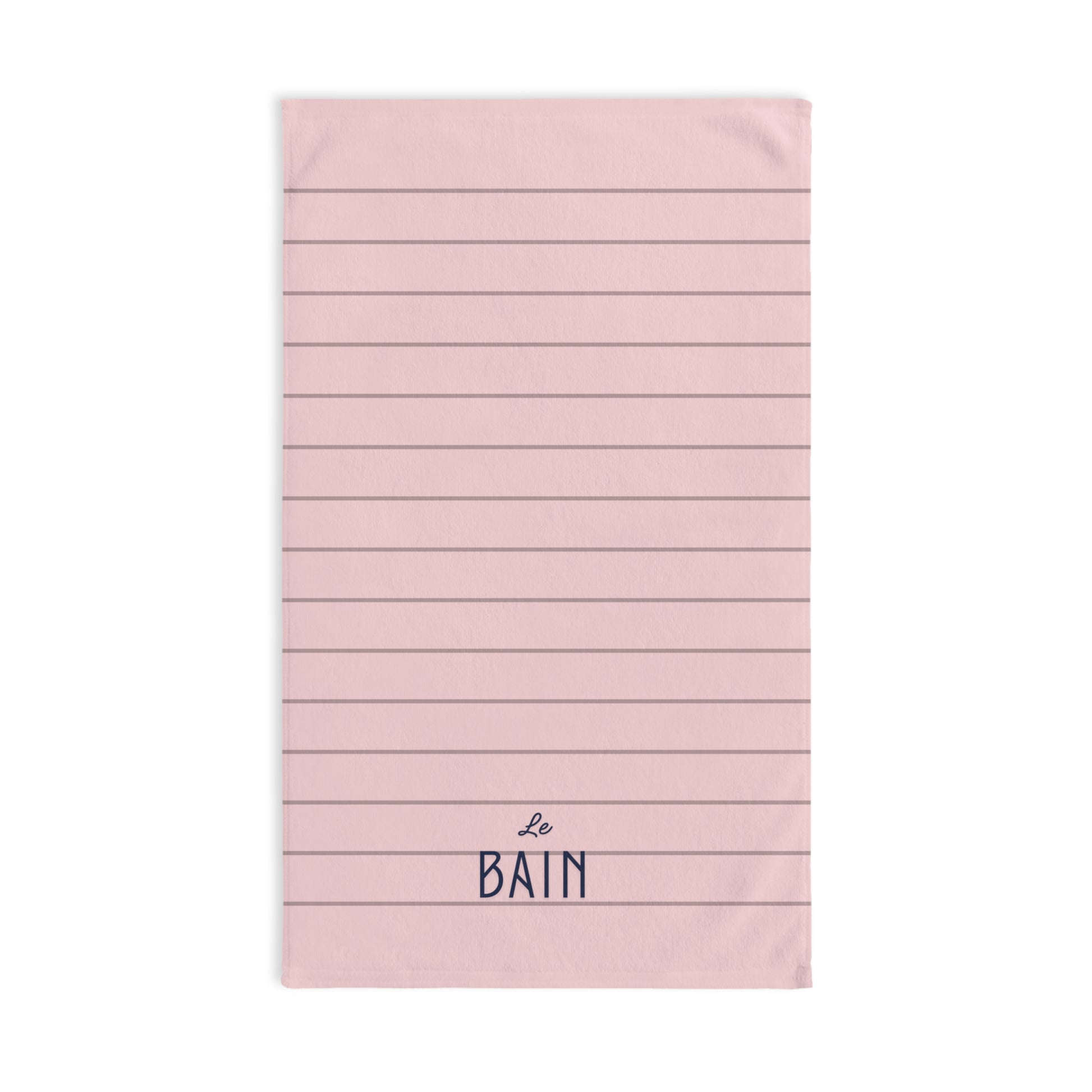 Pink towel with horizontal stripes and 'Le Bain' text on a white background