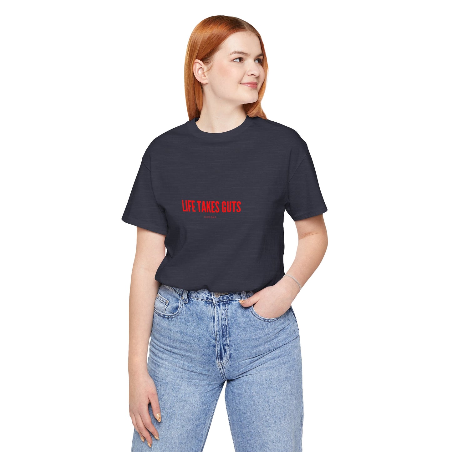 Person wearing a black t-shirt with red text on a white background