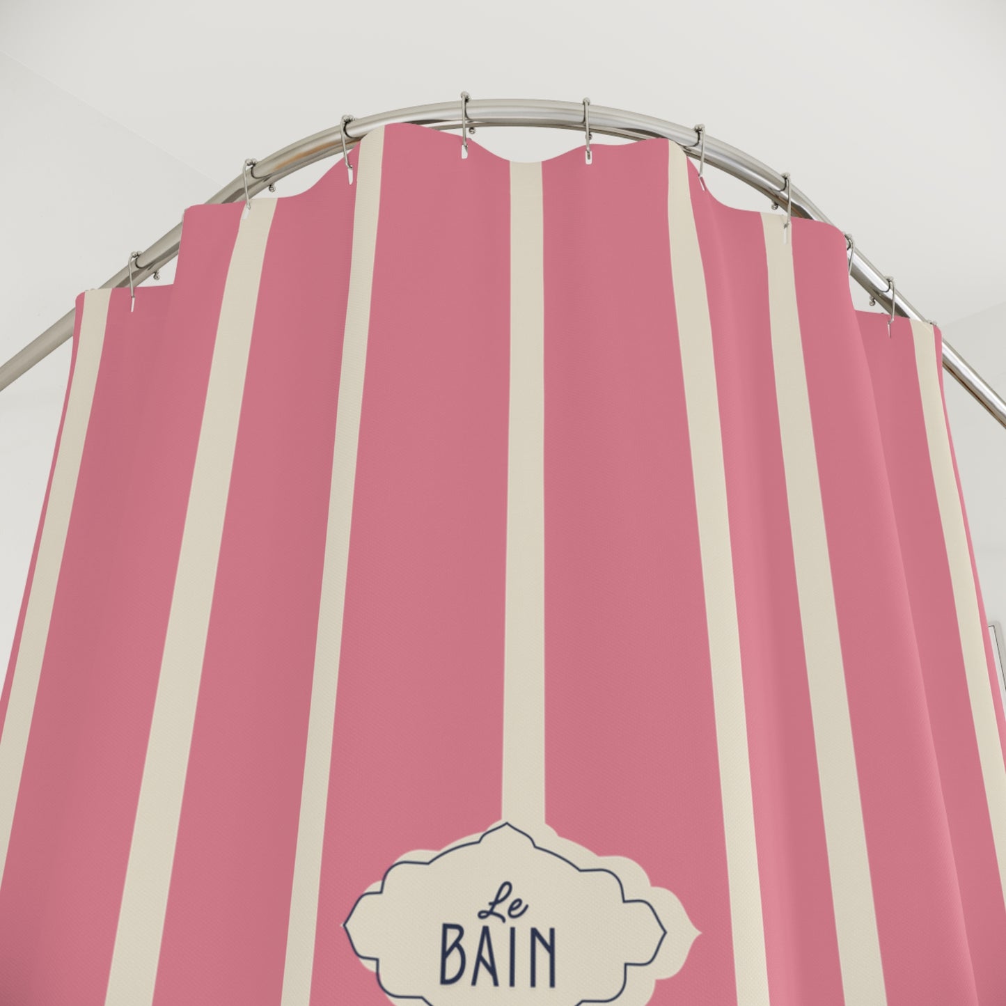 Pink and cream vertical striped bistro curtain with a silver metal rod and a decorative 'Le Bain' label at the bottom.