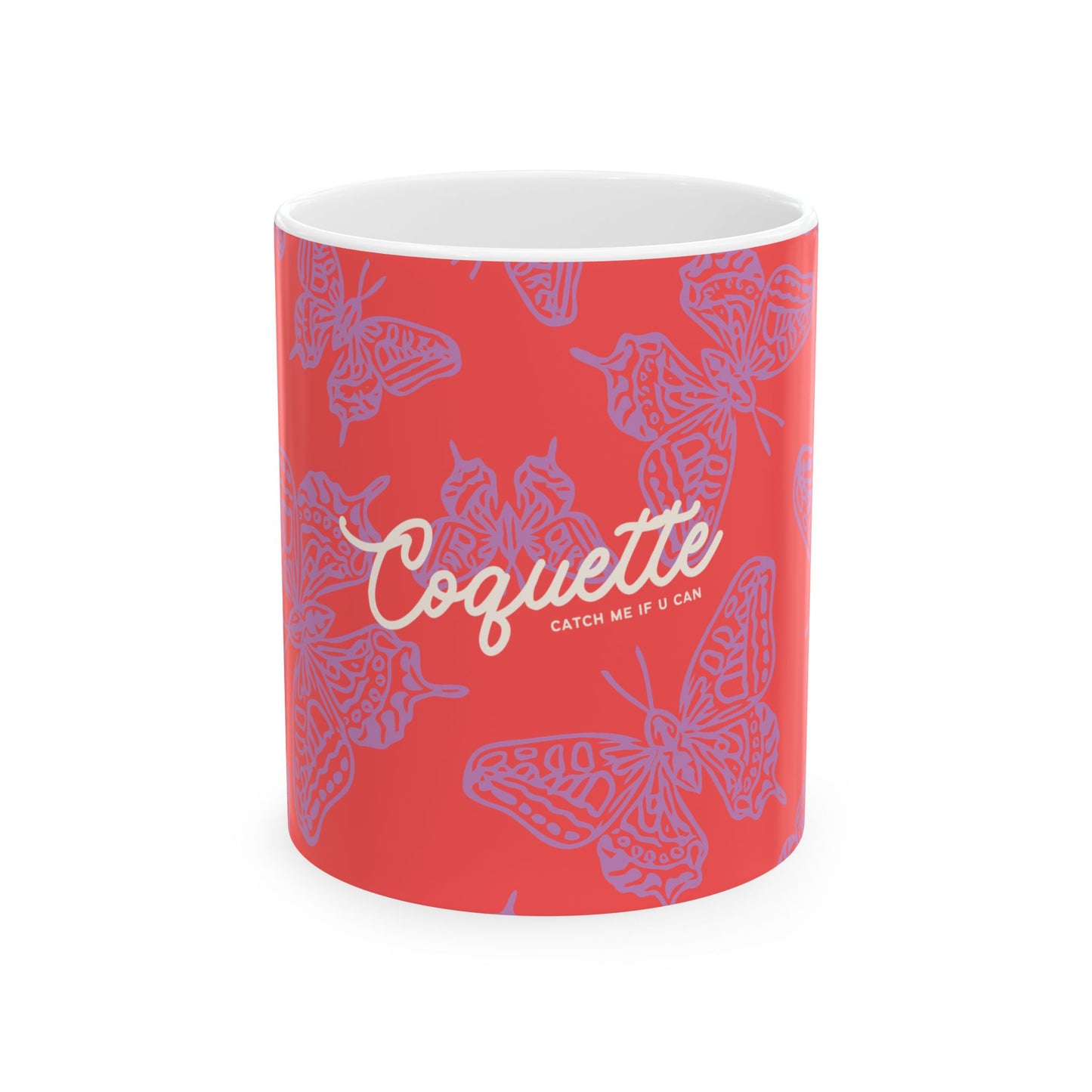 Red mug with butterfly patterns and 'Coquette' branding on a white background