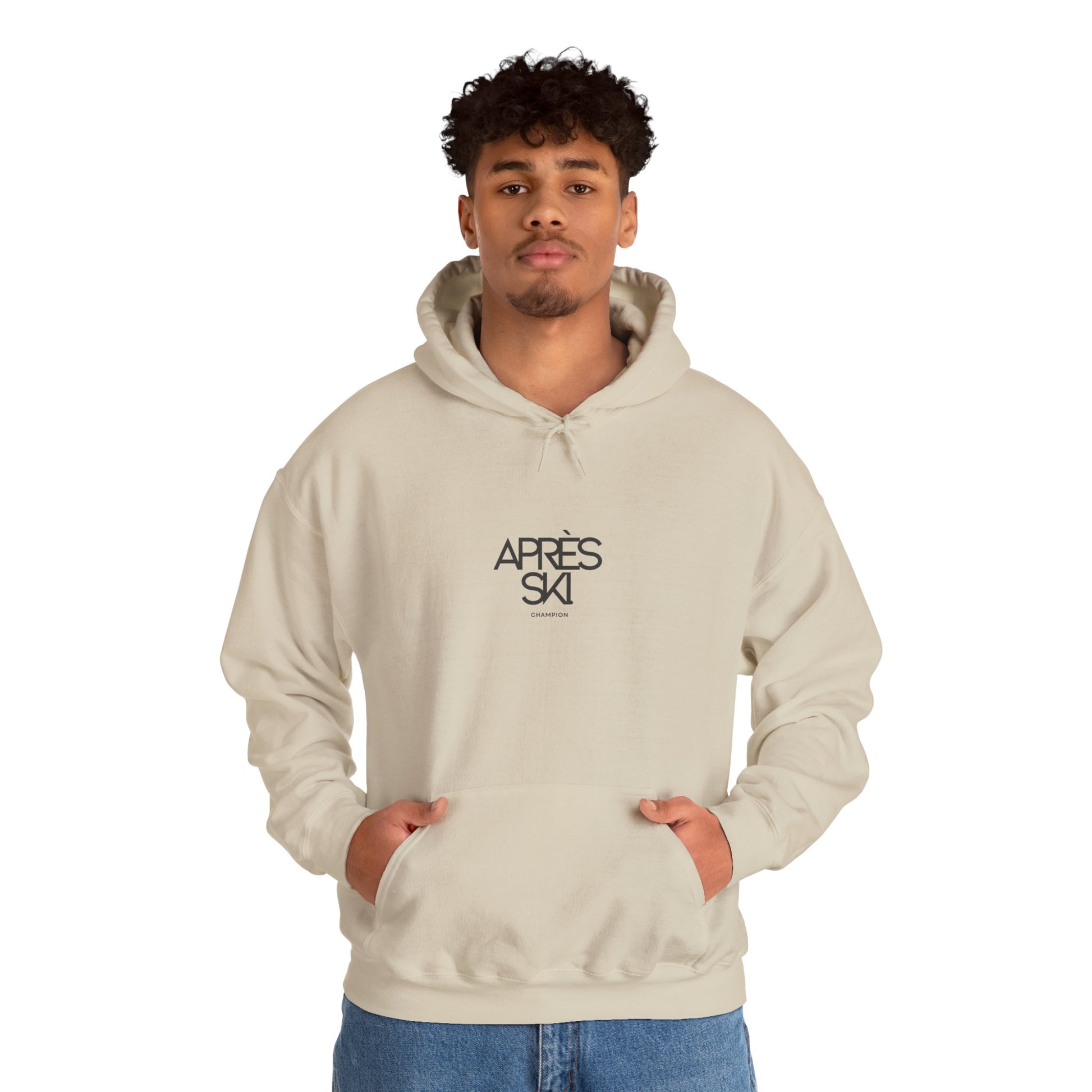 Person wearing a beige hoodie with 'APRES SKI' text on a white background