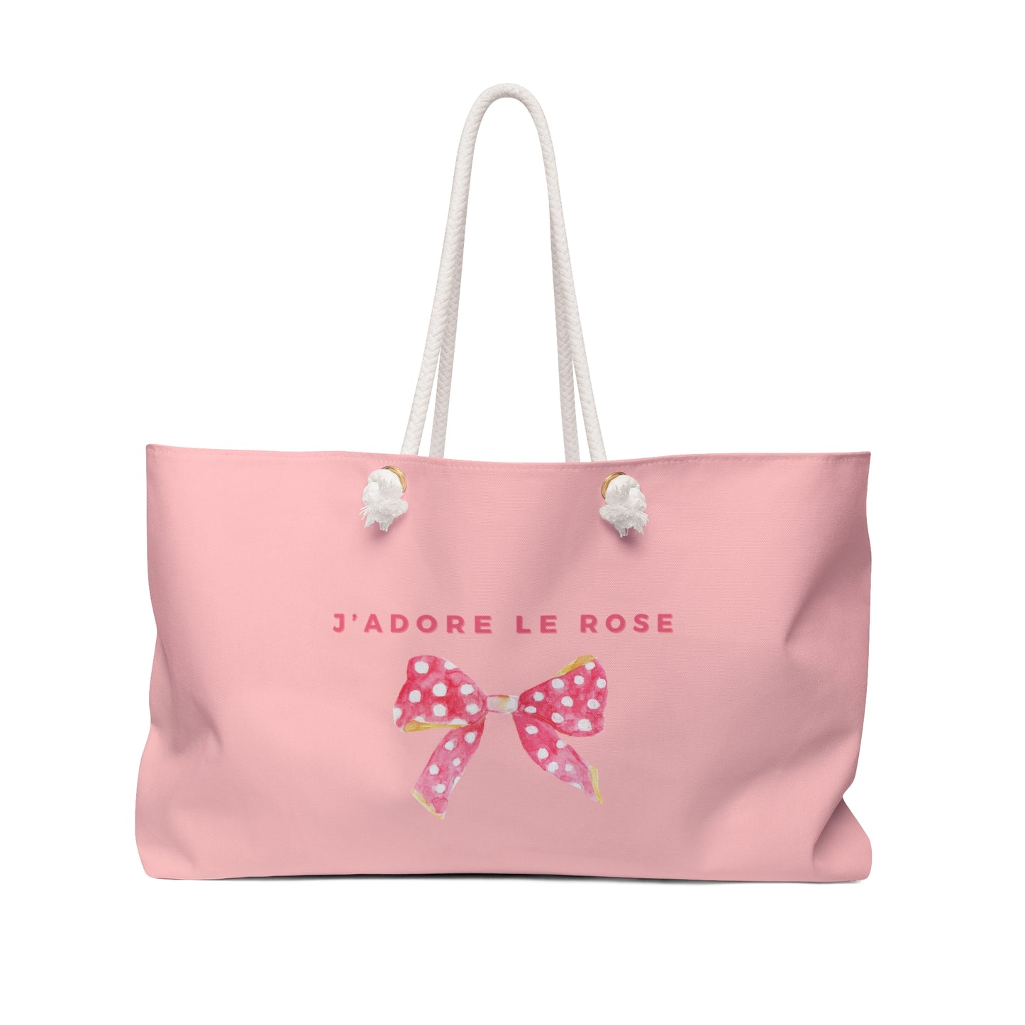 Pink tote bag with a bow and 'J'adore Le Rose' text on a white background