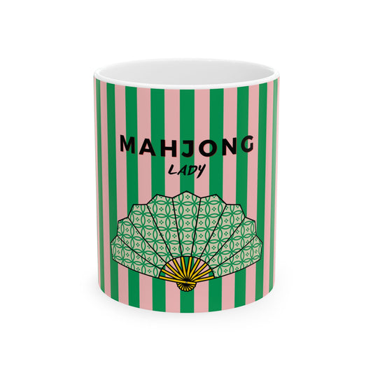 Mug with green and pink striped pattern and 'MAHJONG LADY' text on a white background