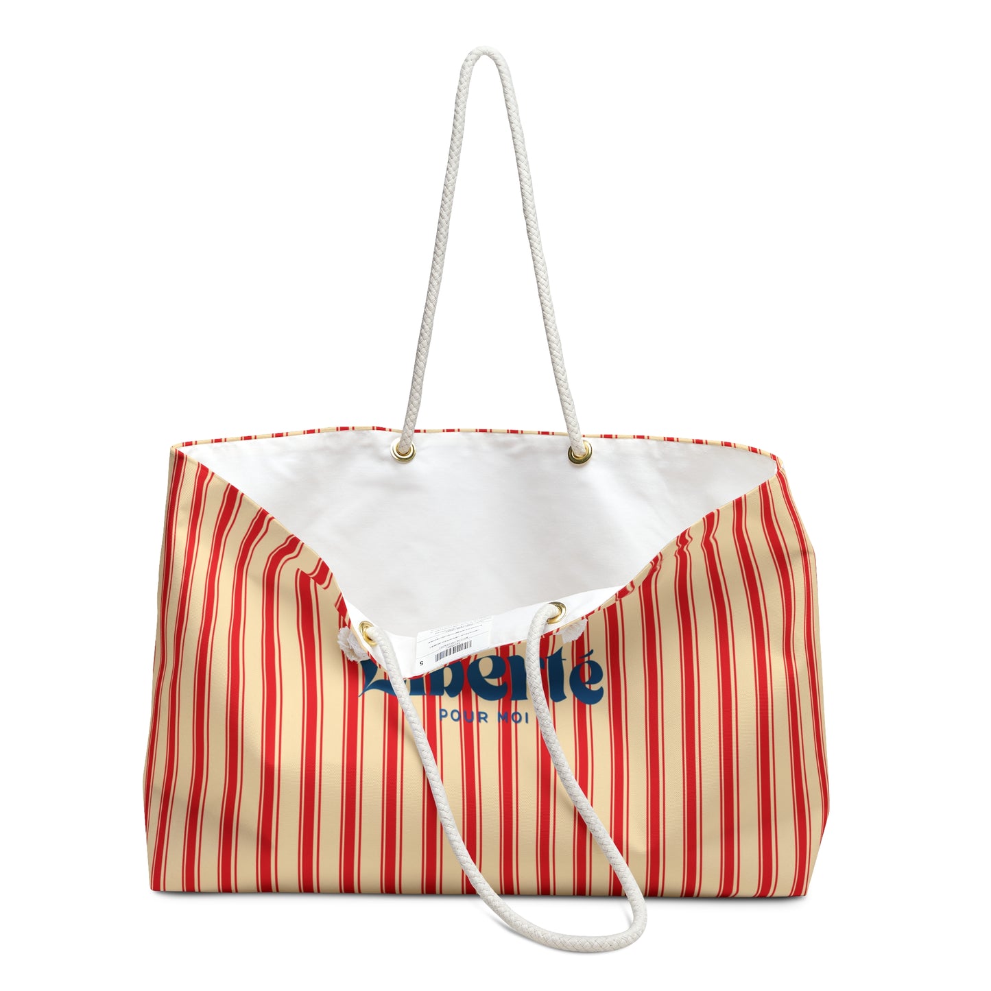 Striped beach bag with white handle on a white background
