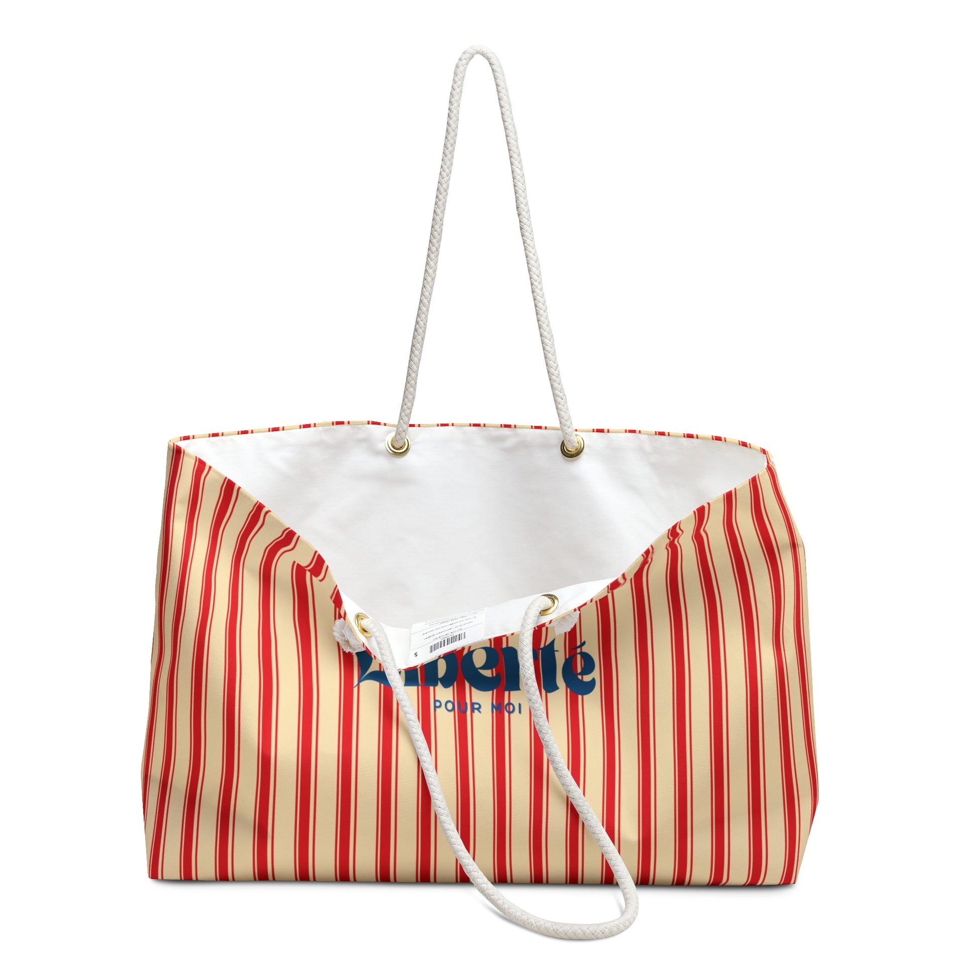 Striped beach bag with white handle on a white background