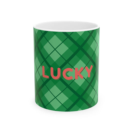 Green plaid mug with red 'LUCKY' text on a white background