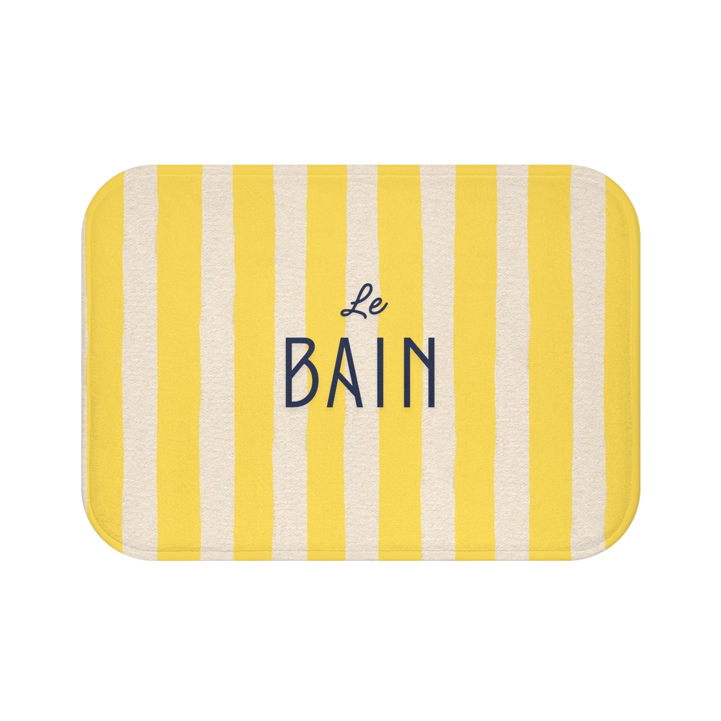 Yellow and white striped bath mat with 'Le Bain' text on a white background