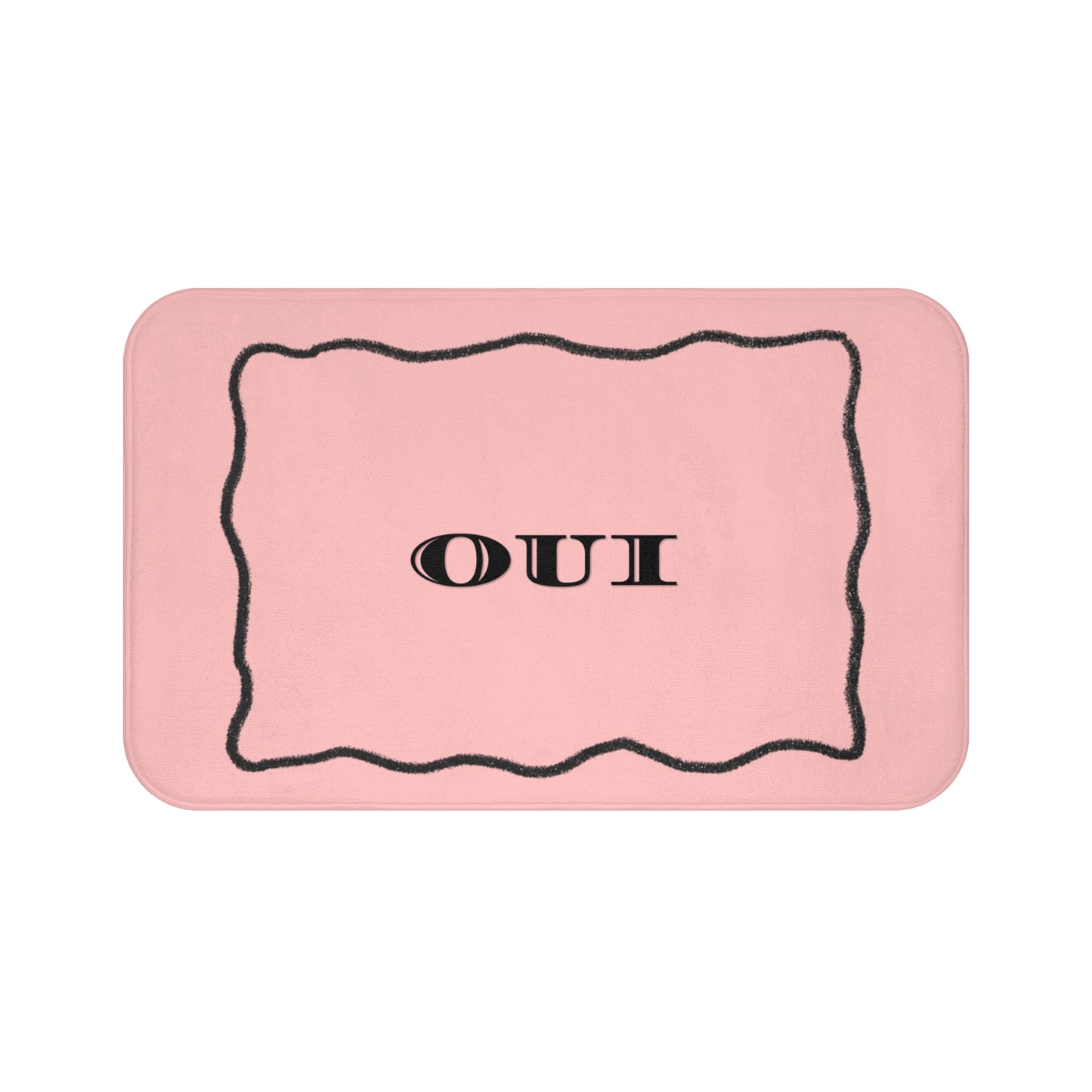 Pink rectangular mat with 'OUI' text on a white background