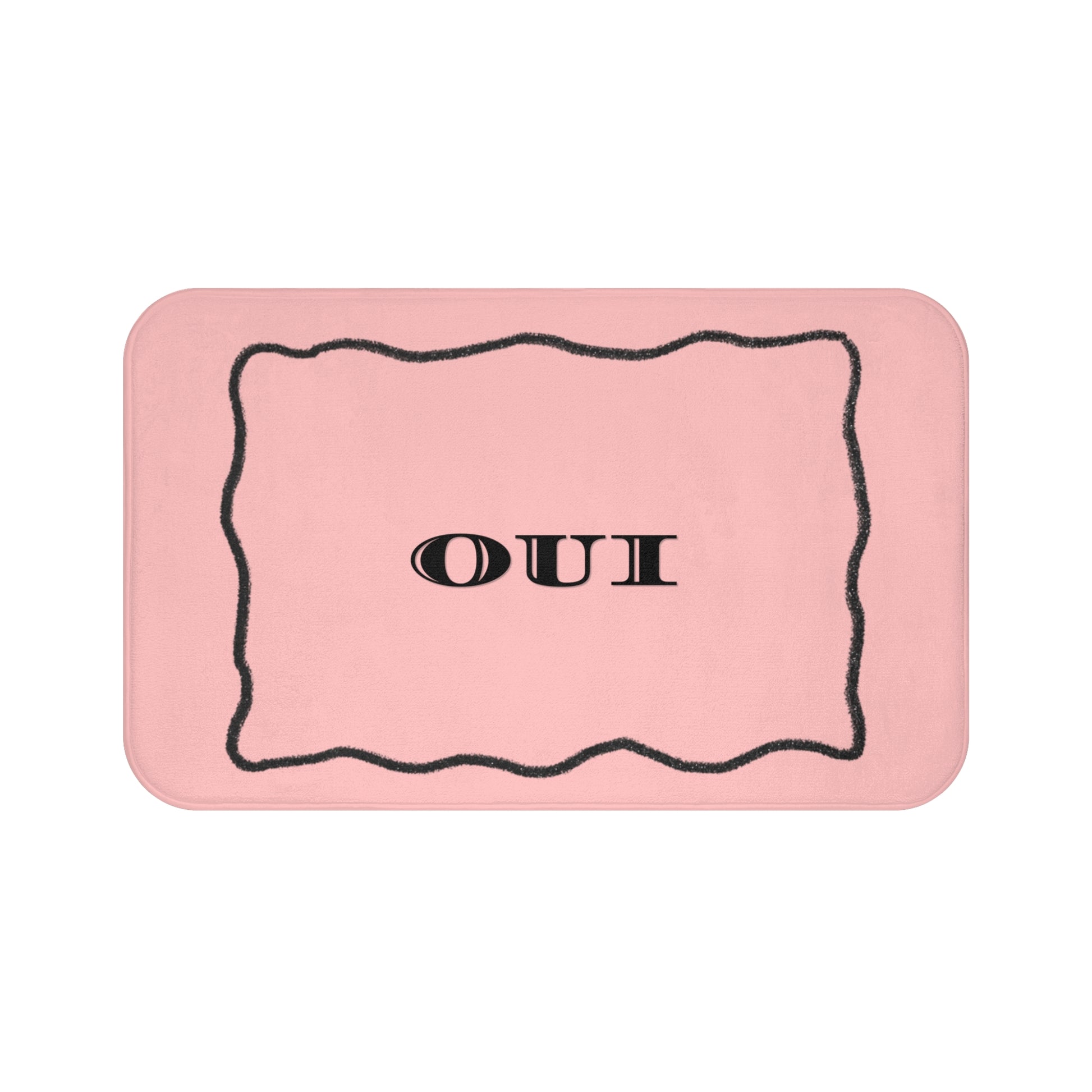 Pink rectangular mat with 'OUI' text on a white background