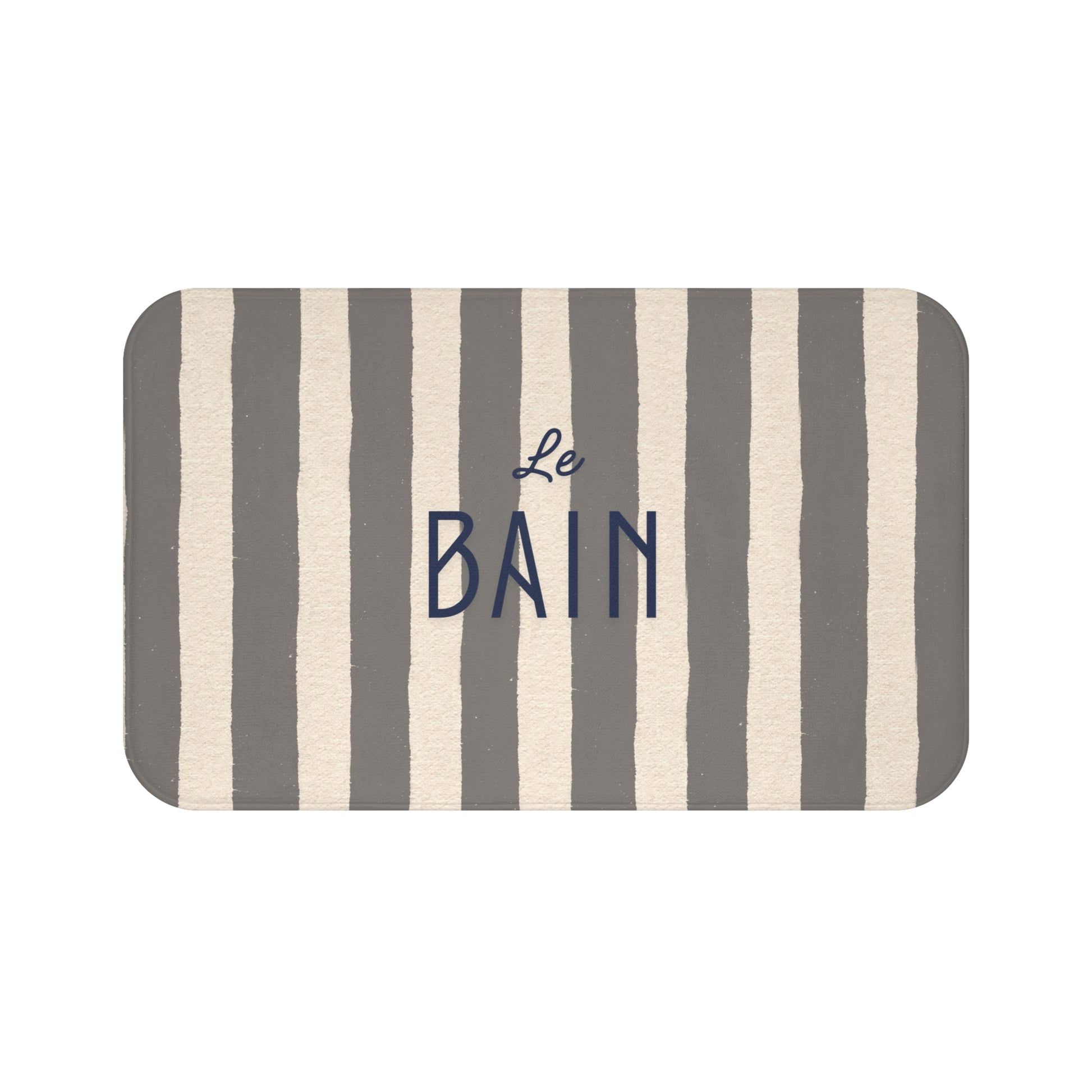 Striped bath mat with 'Le Bain' text on a white background