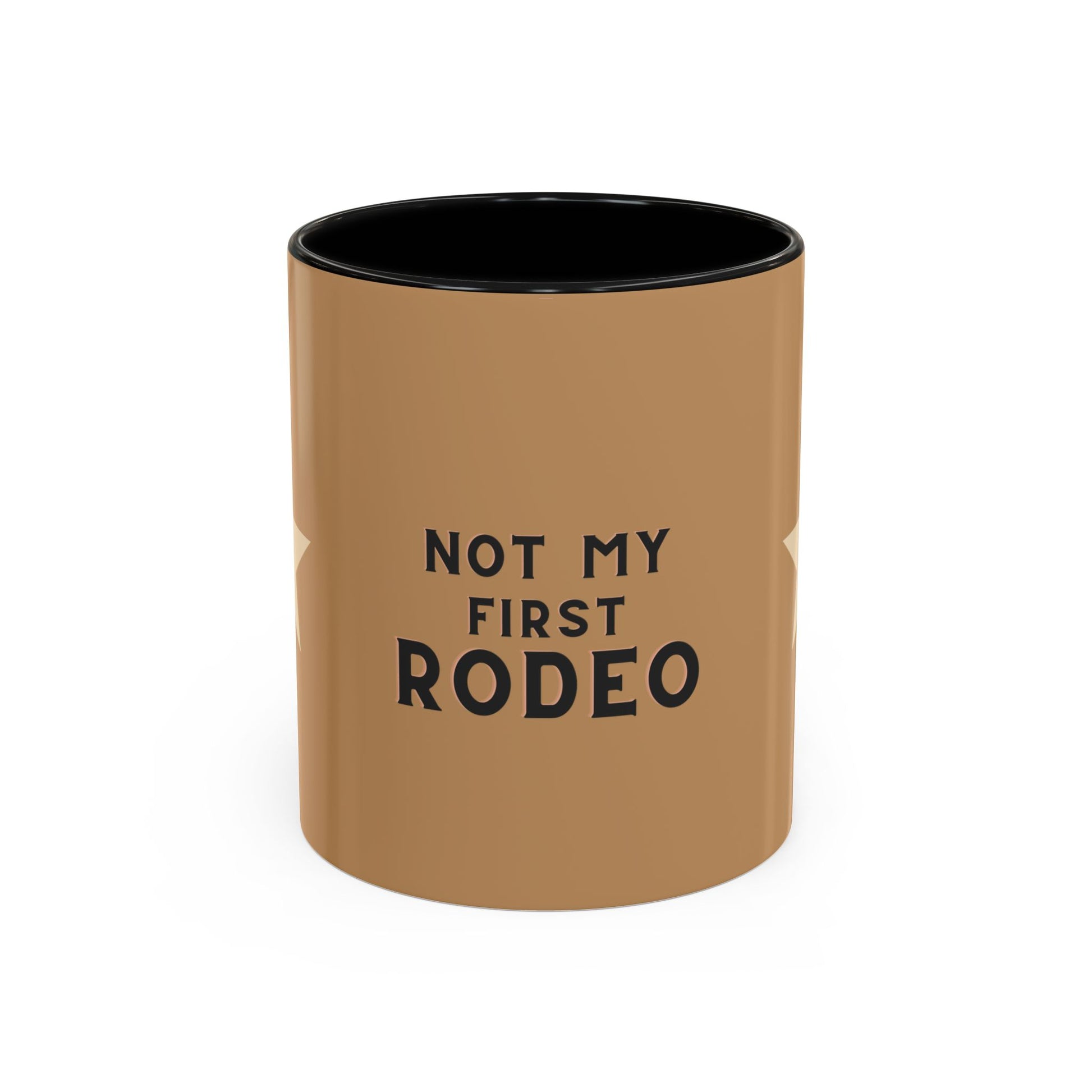 Brown mug with black interior and 'Not My First Rodeo' text on a white background